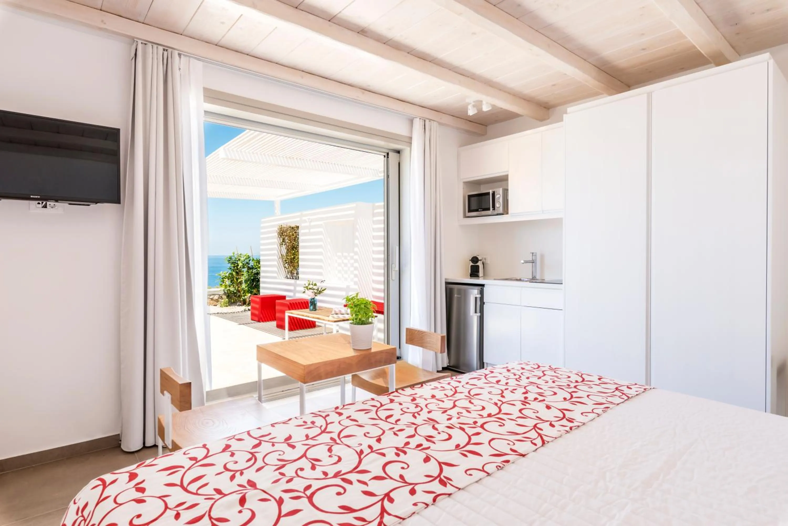 Bed in O Lofos Luxury Boutique Suites