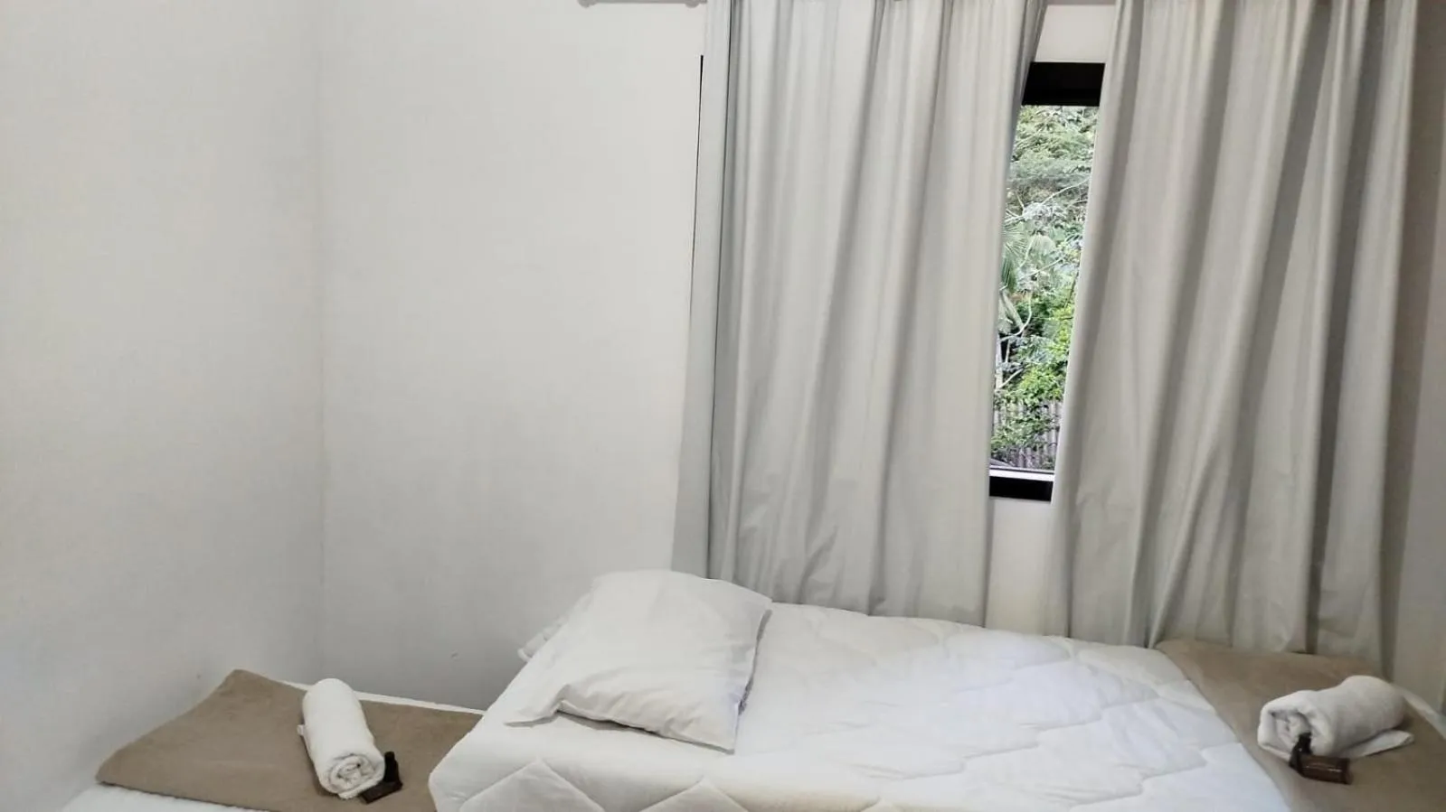 Bed in Pousada Viking Penedo