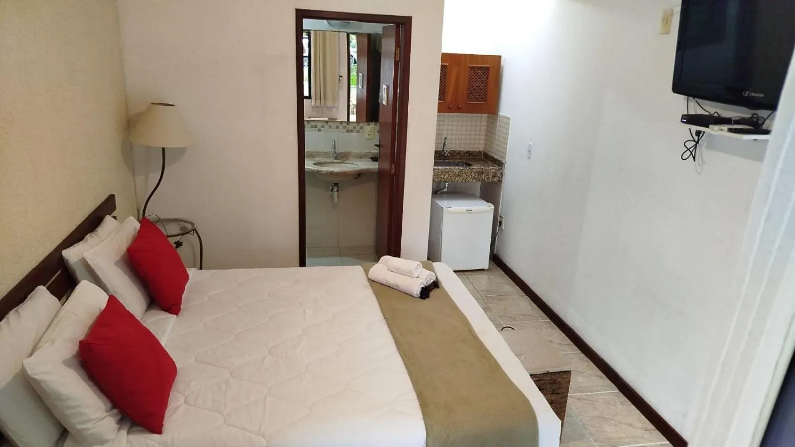 Bed in Pousada Viking Penedo