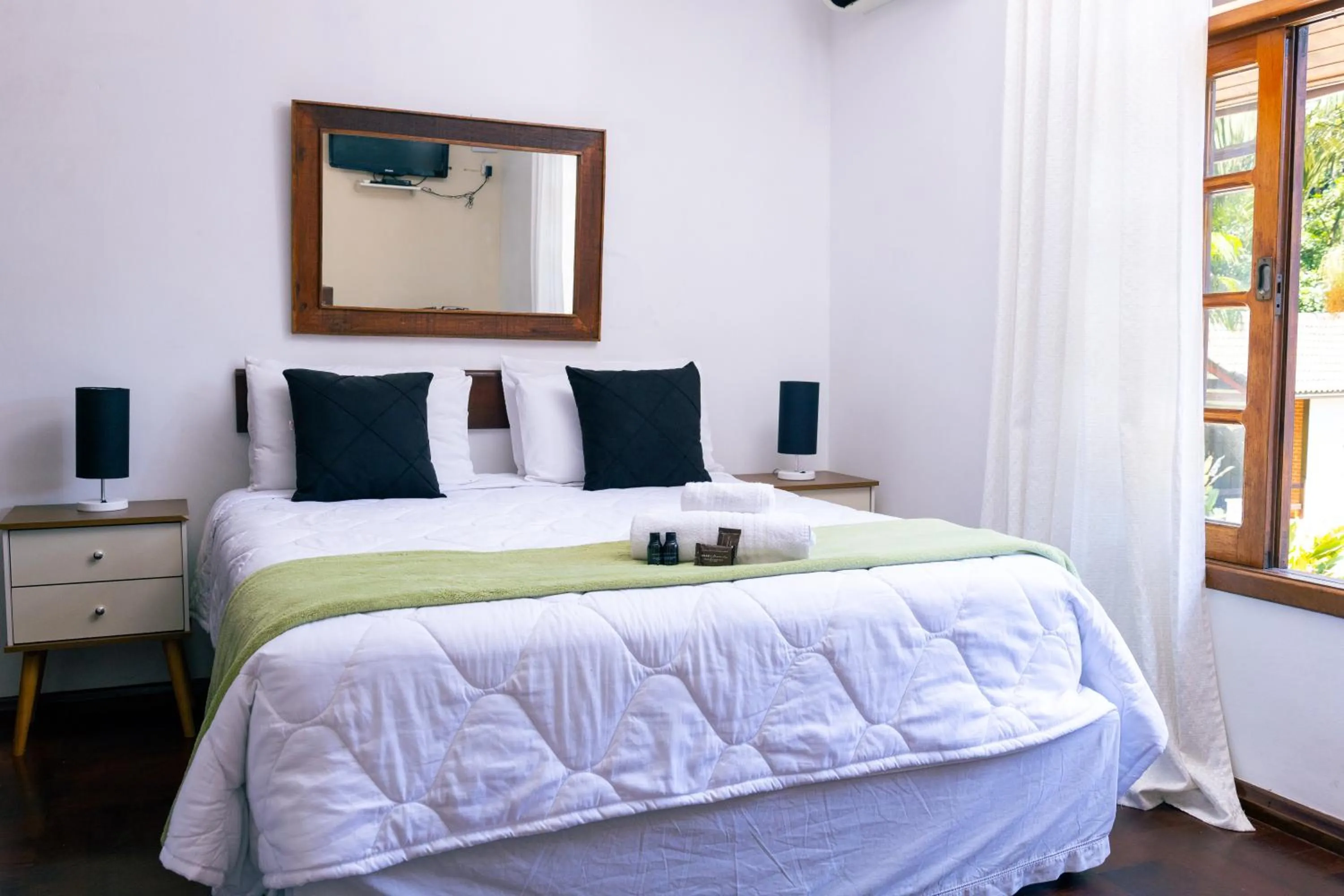 Bed in Pousada Viking Penedo