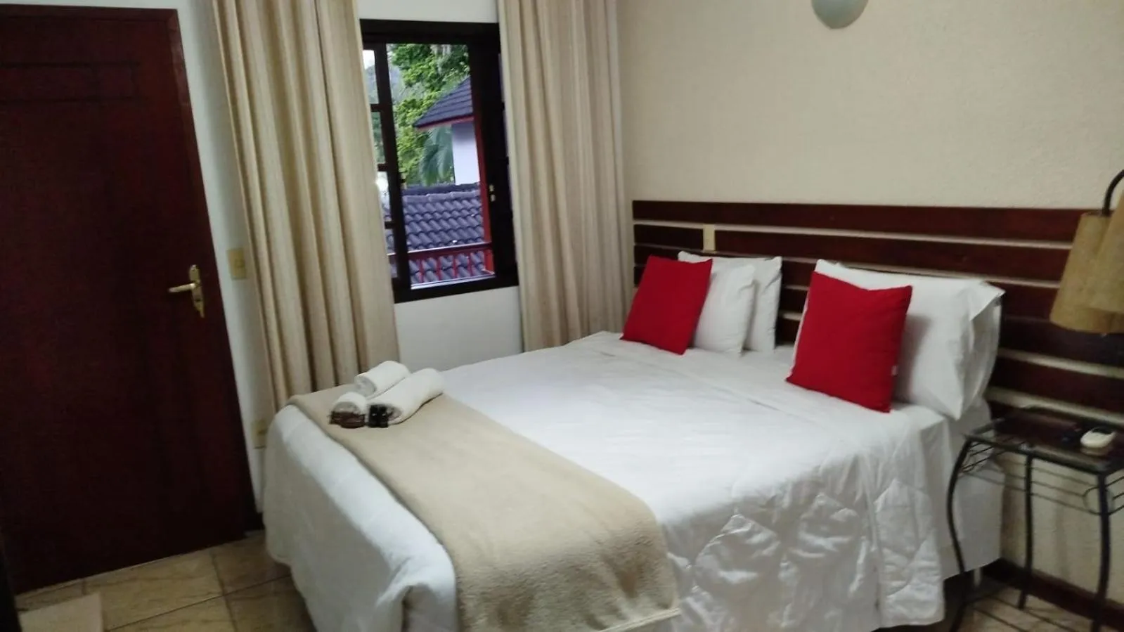 Bed in Pousada Viking Penedo