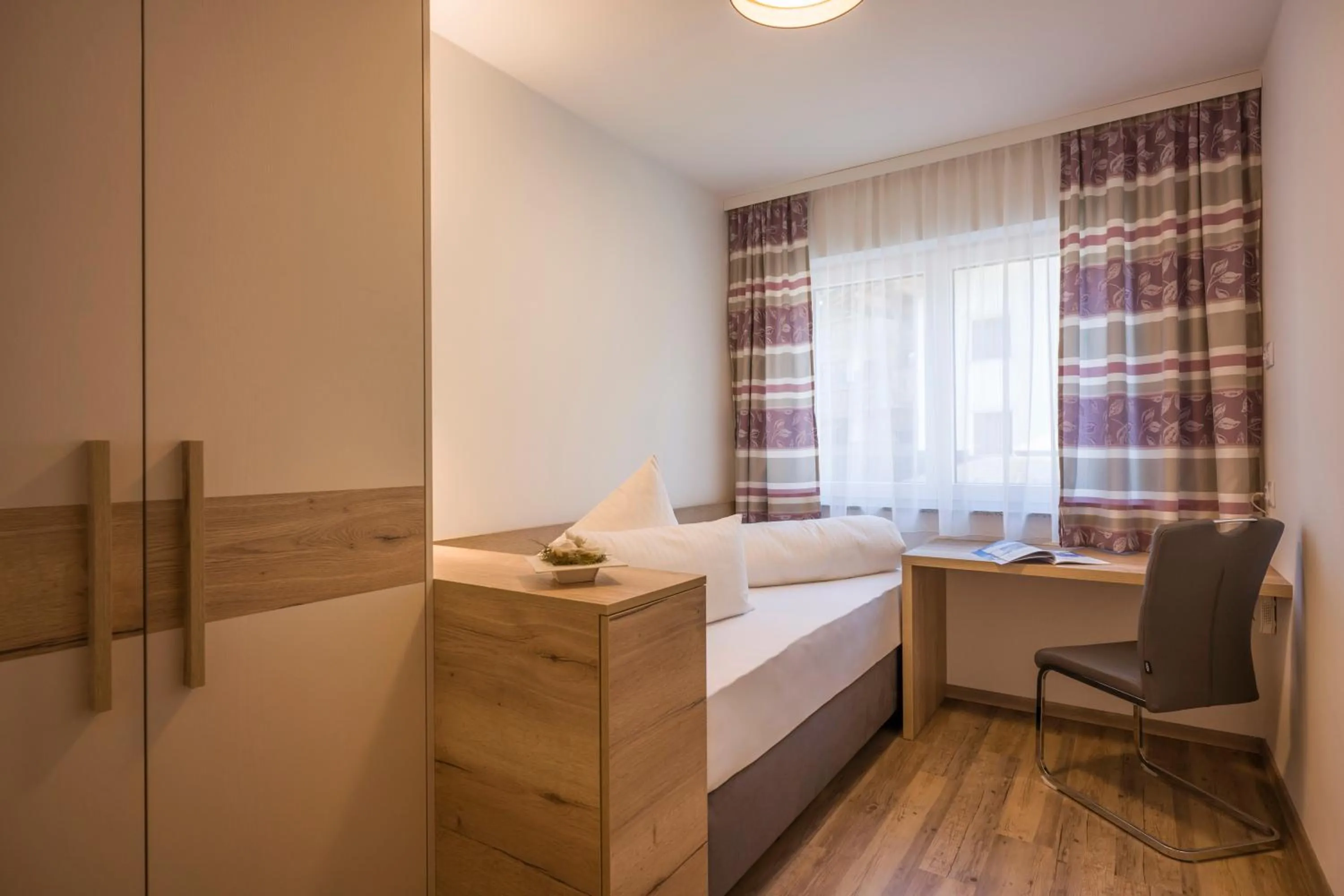 Bedroom, Bed in Aparthotel AlpTirol