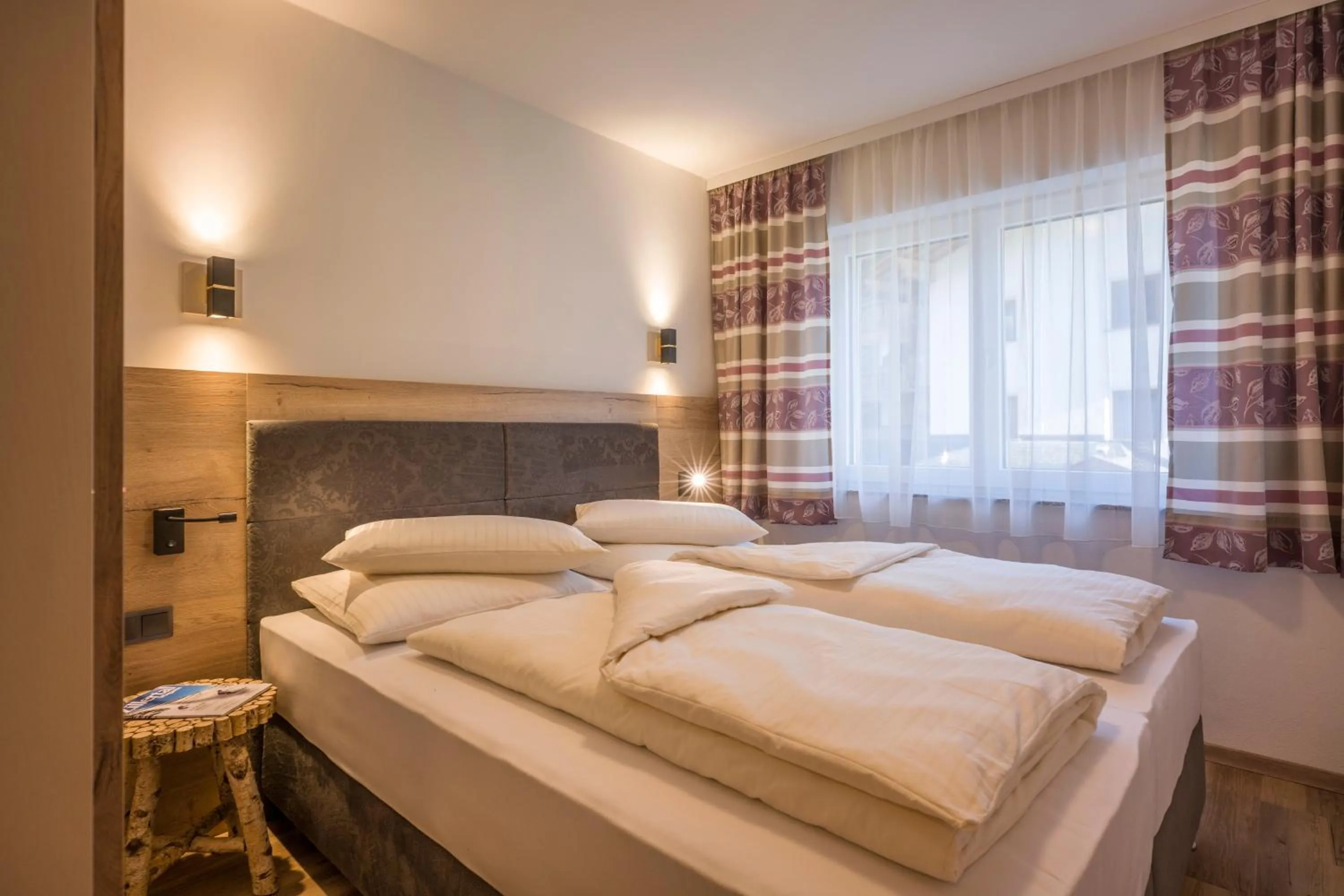 Bedroom, Bed in Aparthotel AlpTirol