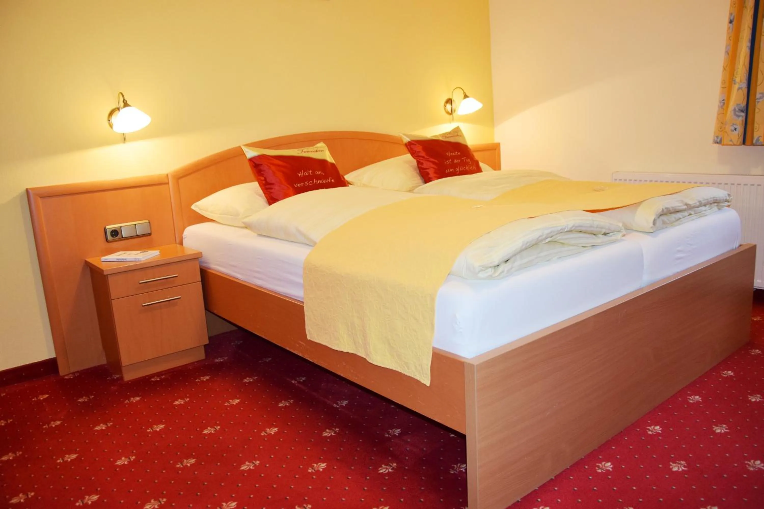 Photo of the whole room, Bed in Gasthaus-Landhotel Traunstein