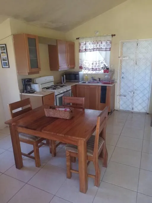 TV and multimedia in Cheerful 2-Bedroom Home in Falmouth Garden