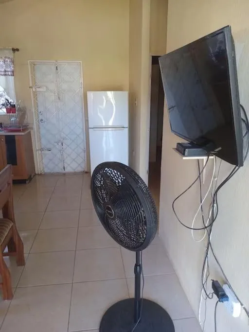 TV and multimedia in Cheerful 2-Bedroom Home in Falmouth Garden