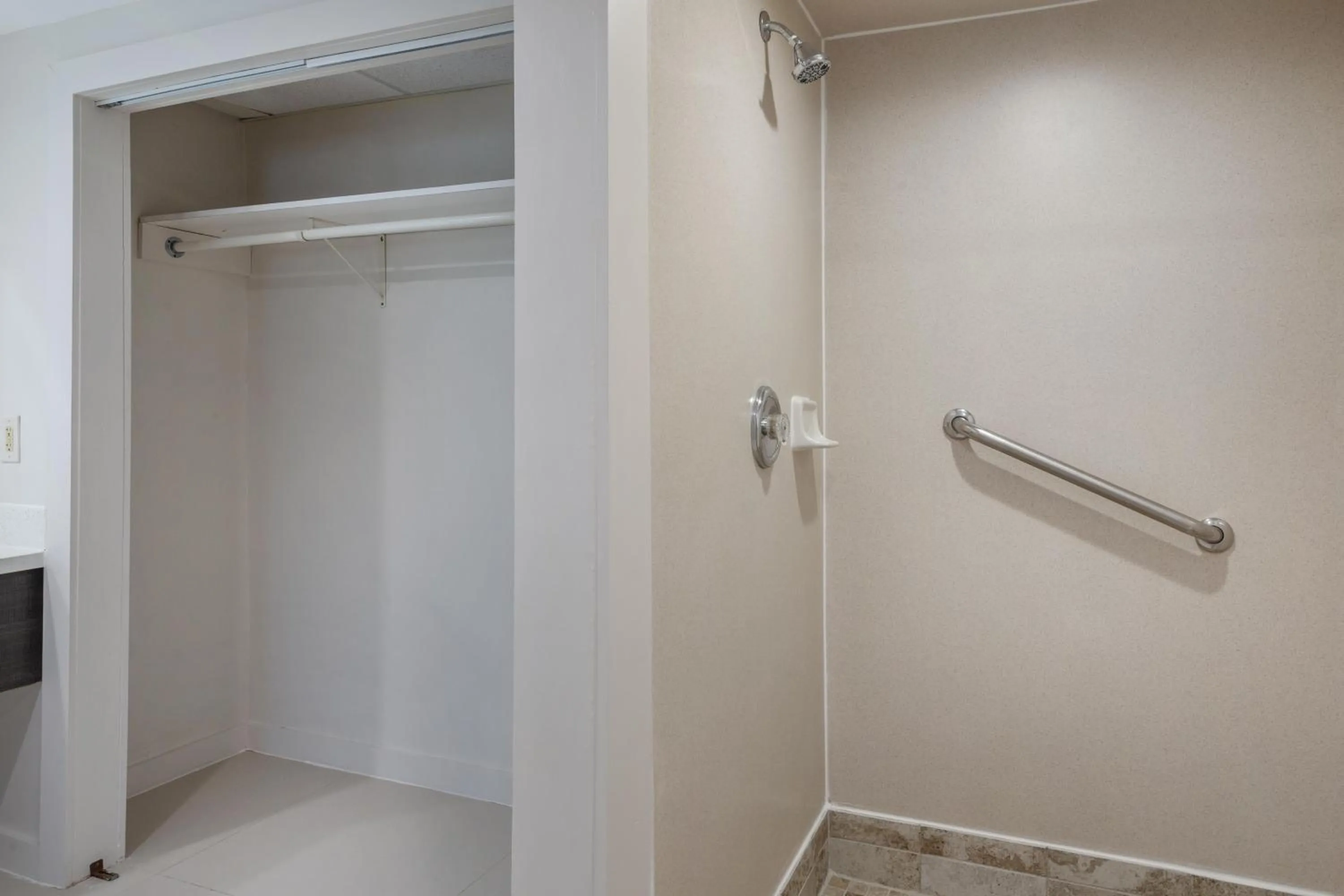 Bathroom in HOM Hotel Gainesville, SureStay Collection by Best Western