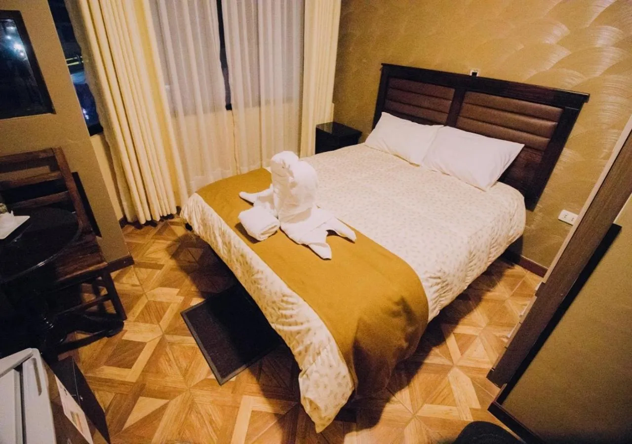 Photo of the whole room, Bed in Las Tholas Hotel