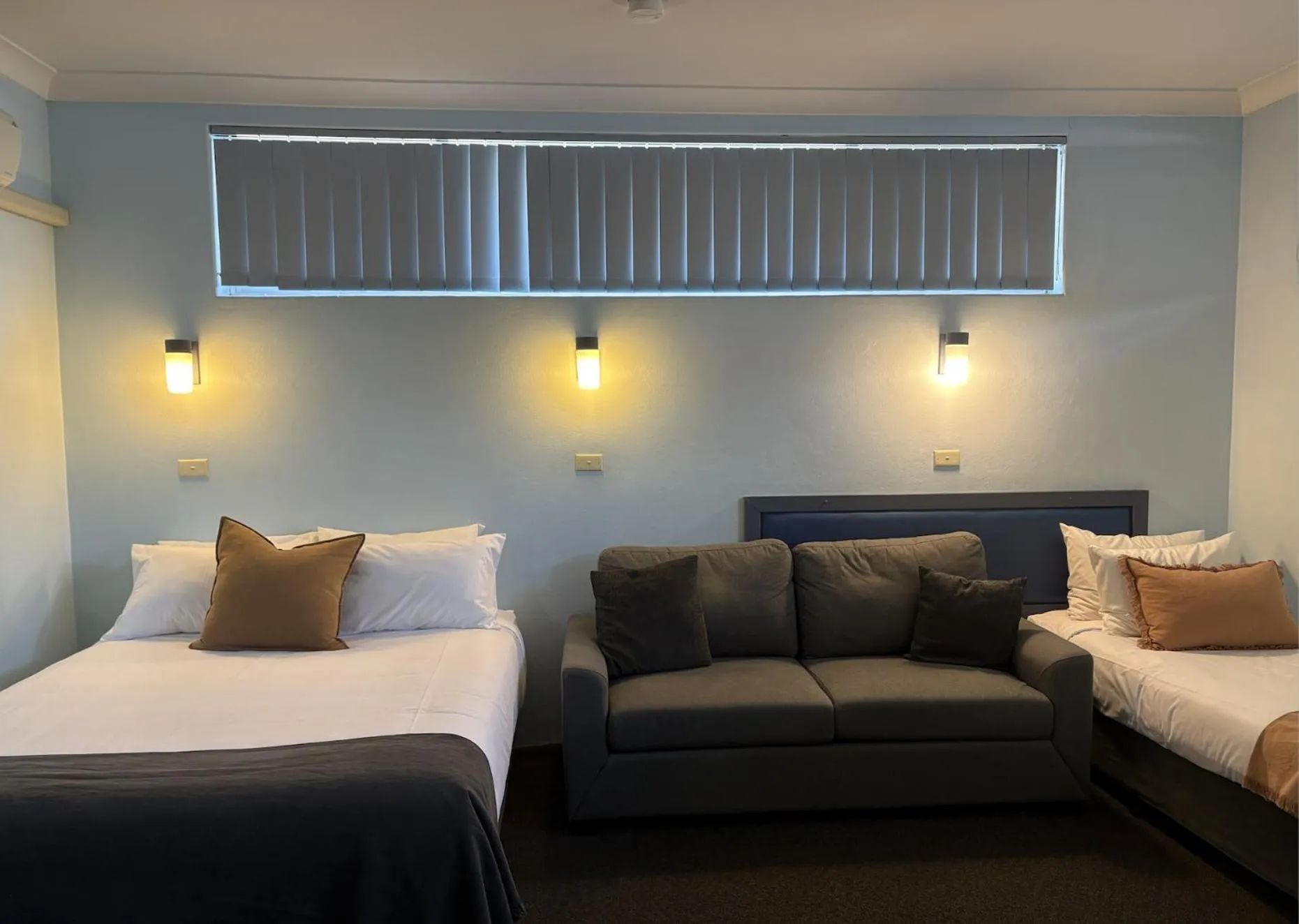 Bed in Tall Timbers Motel