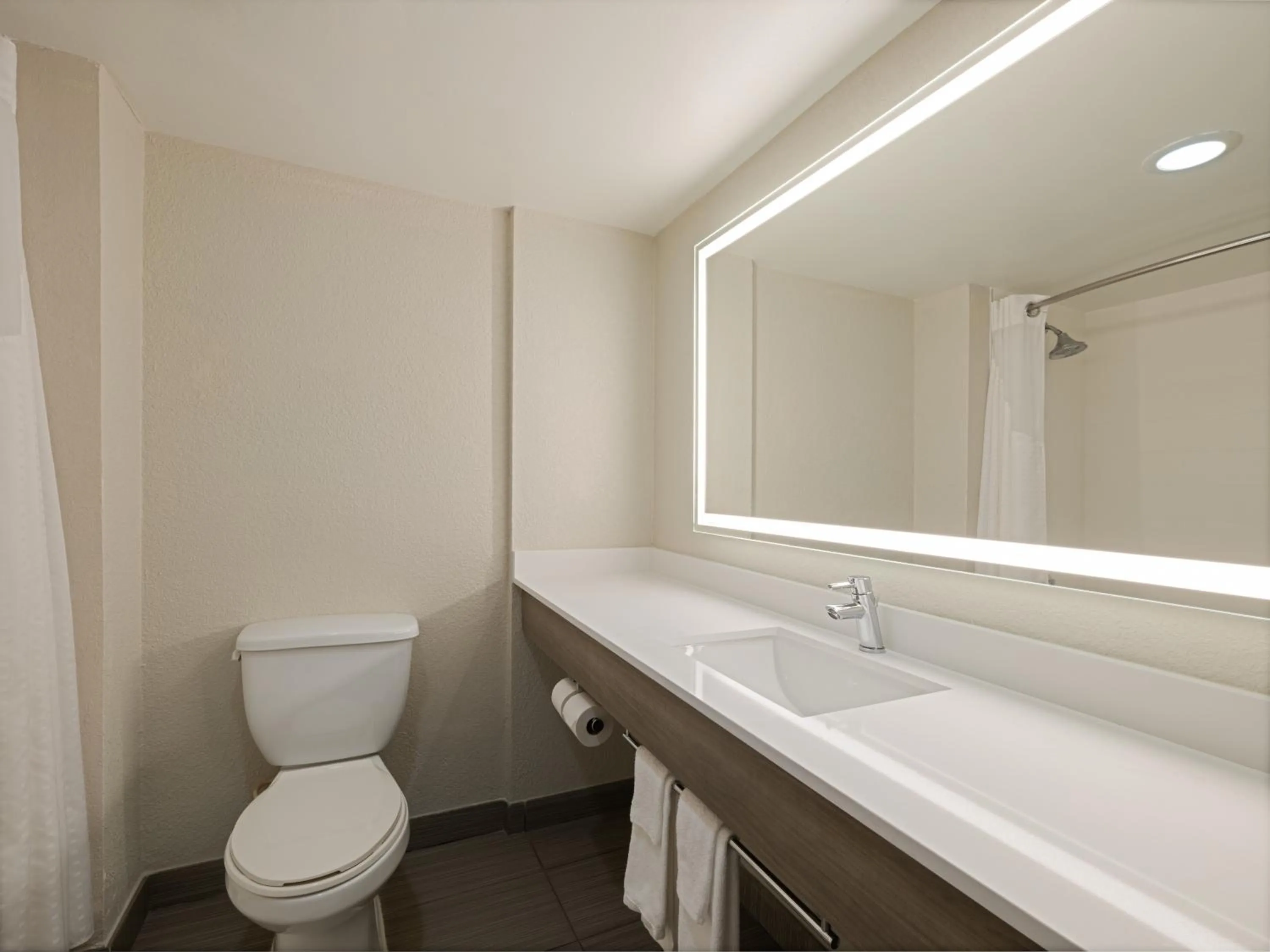 Toilet in Holiday Inn Express Hotel & Suites Ft. Lauderdale-Plantation by IHG