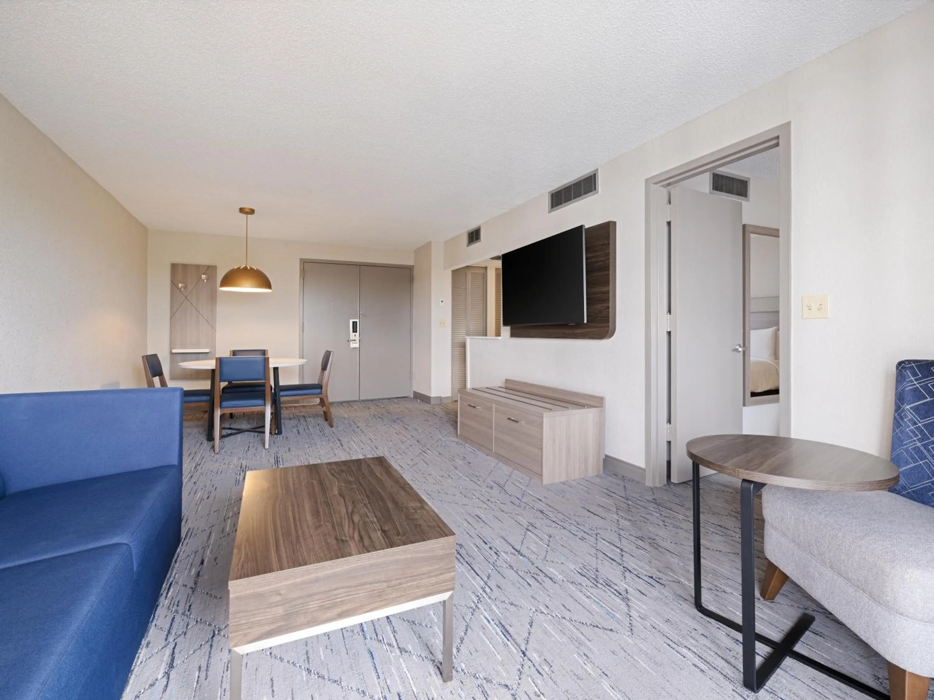 Living room in Holiday Inn Express Hotel & Suites Ft. Lauderdale-Plantation by IHG