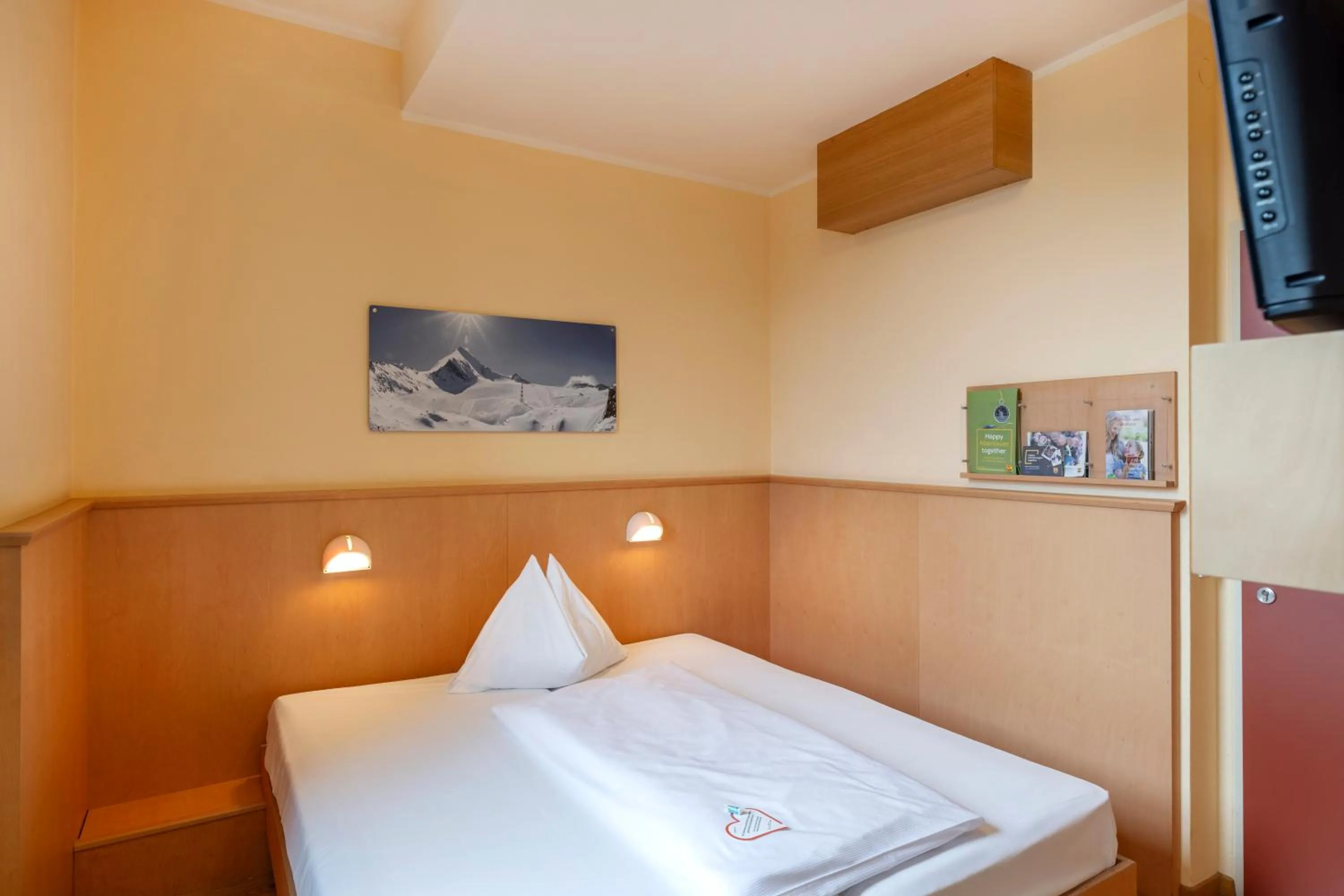 Photo of the whole room, Bed in JUFA Hotel Kaprun