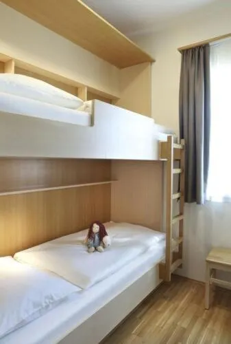 Photo of the whole room, Bed in JUFA Hotel Kaprun