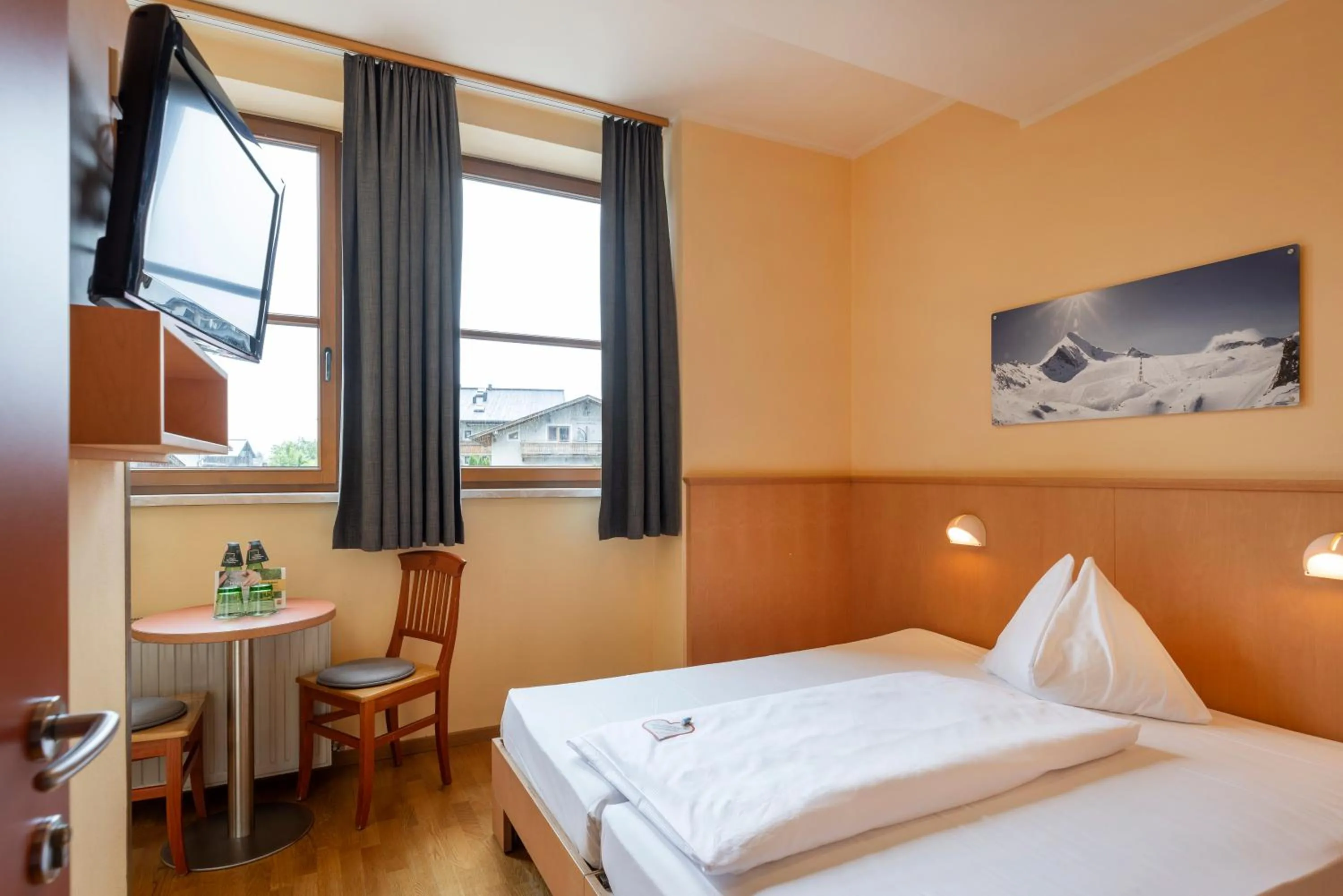 Photo of the whole room, Bed in JUFA Hotel Kaprun