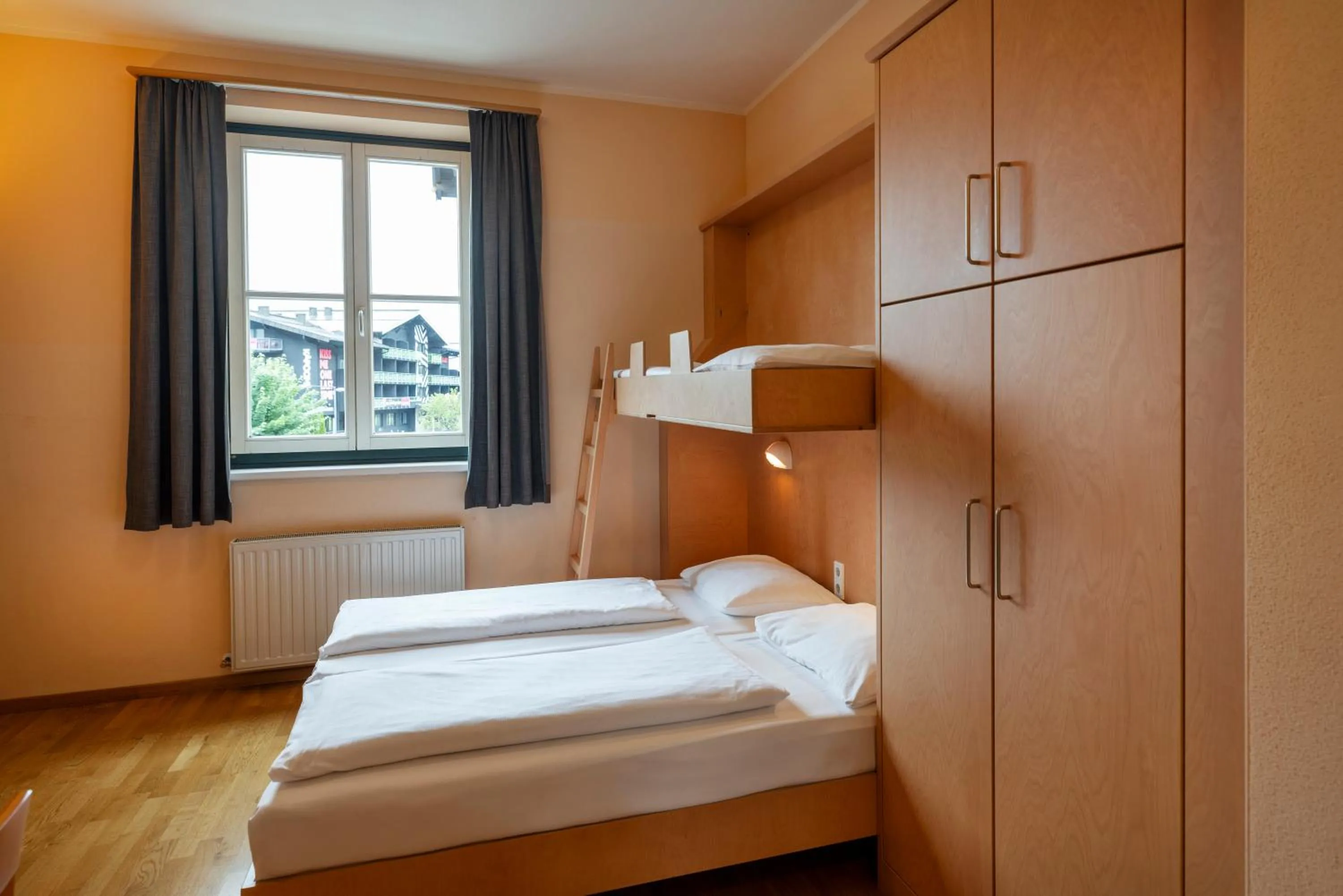 Photo of the whole room, Bed in JUFA Hotel Kaprun