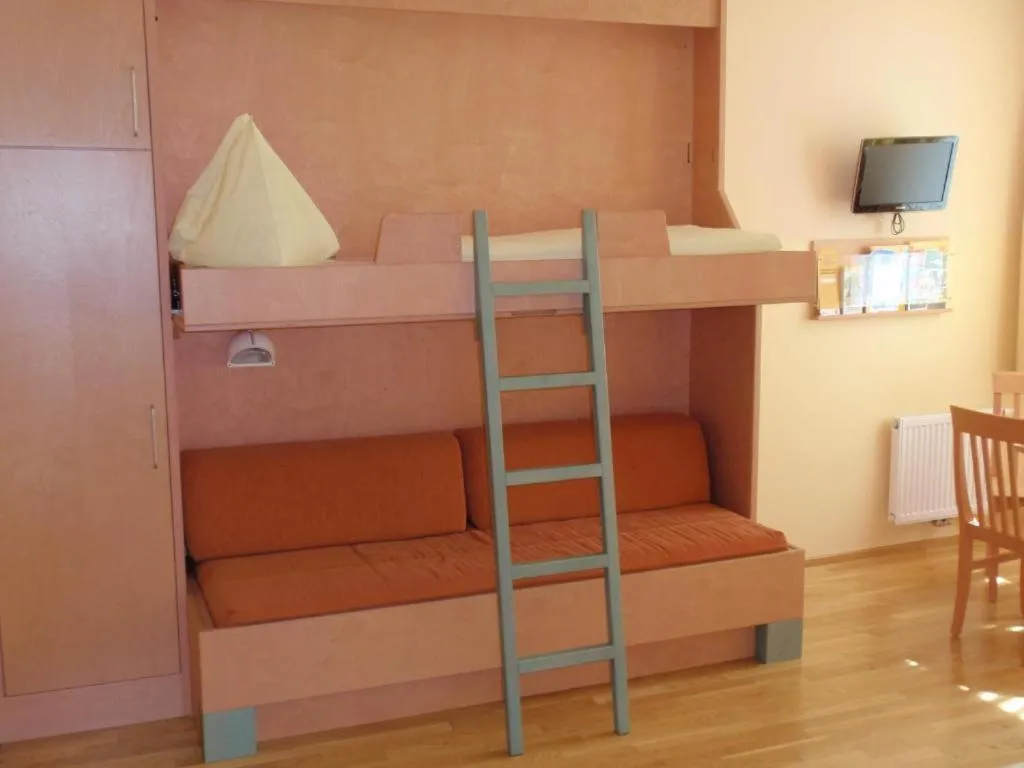 Photo of the whole room, Bed in JUFA Hotel Kaprun