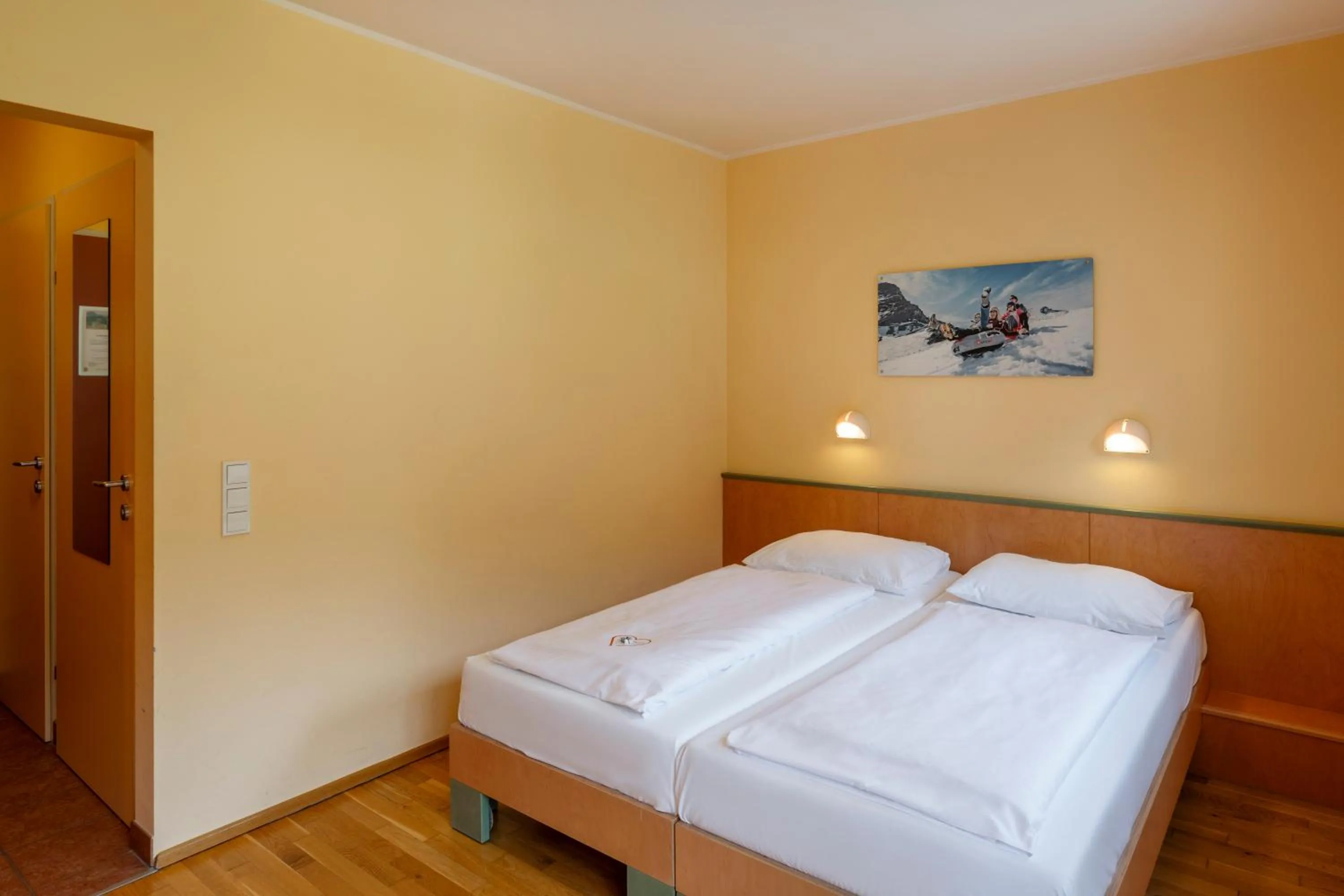 Photo of the whole room, Bed in JUFA Hotel Kaprun