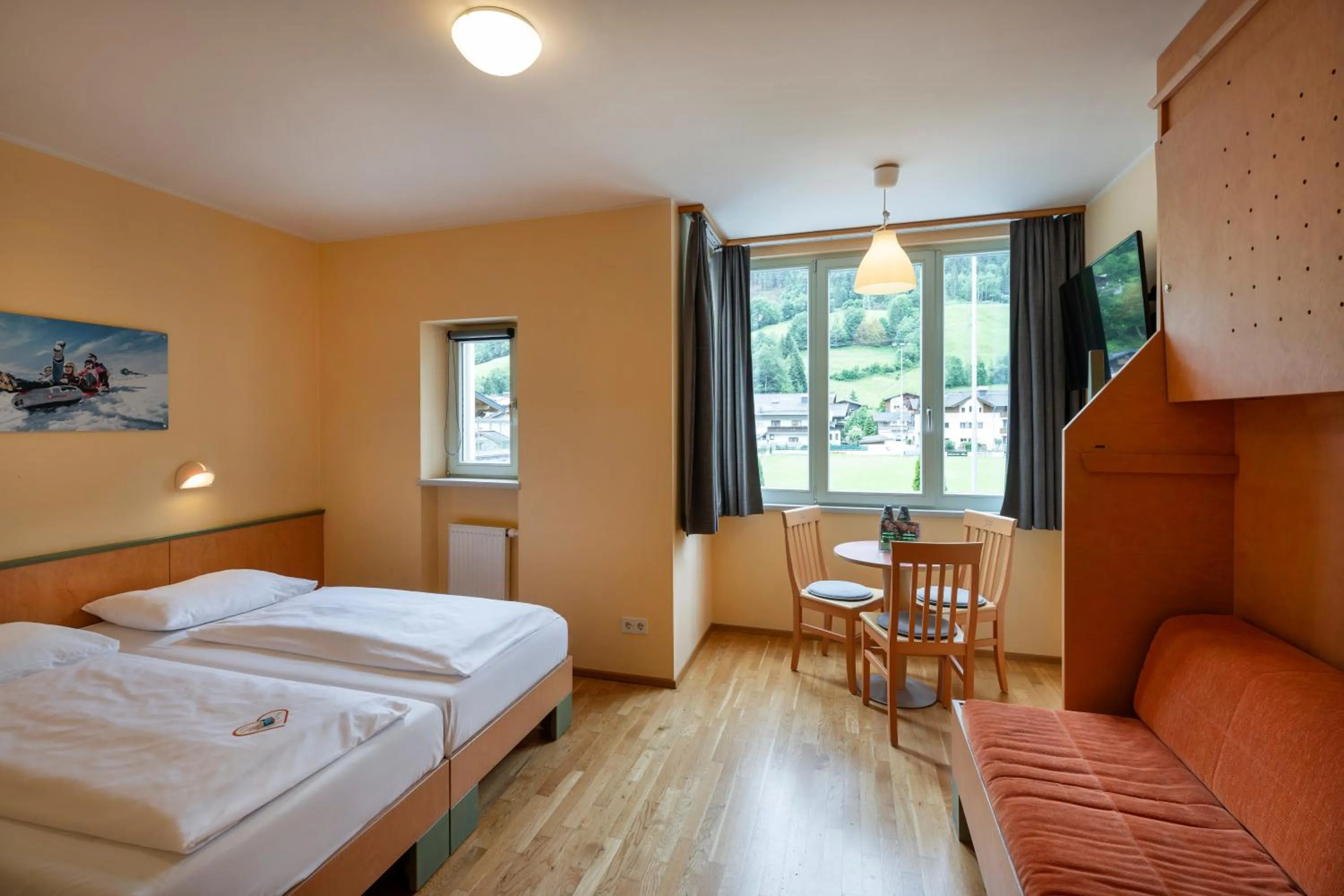 Photo of the whole room, Bed in JUFA Hotel Kaprun