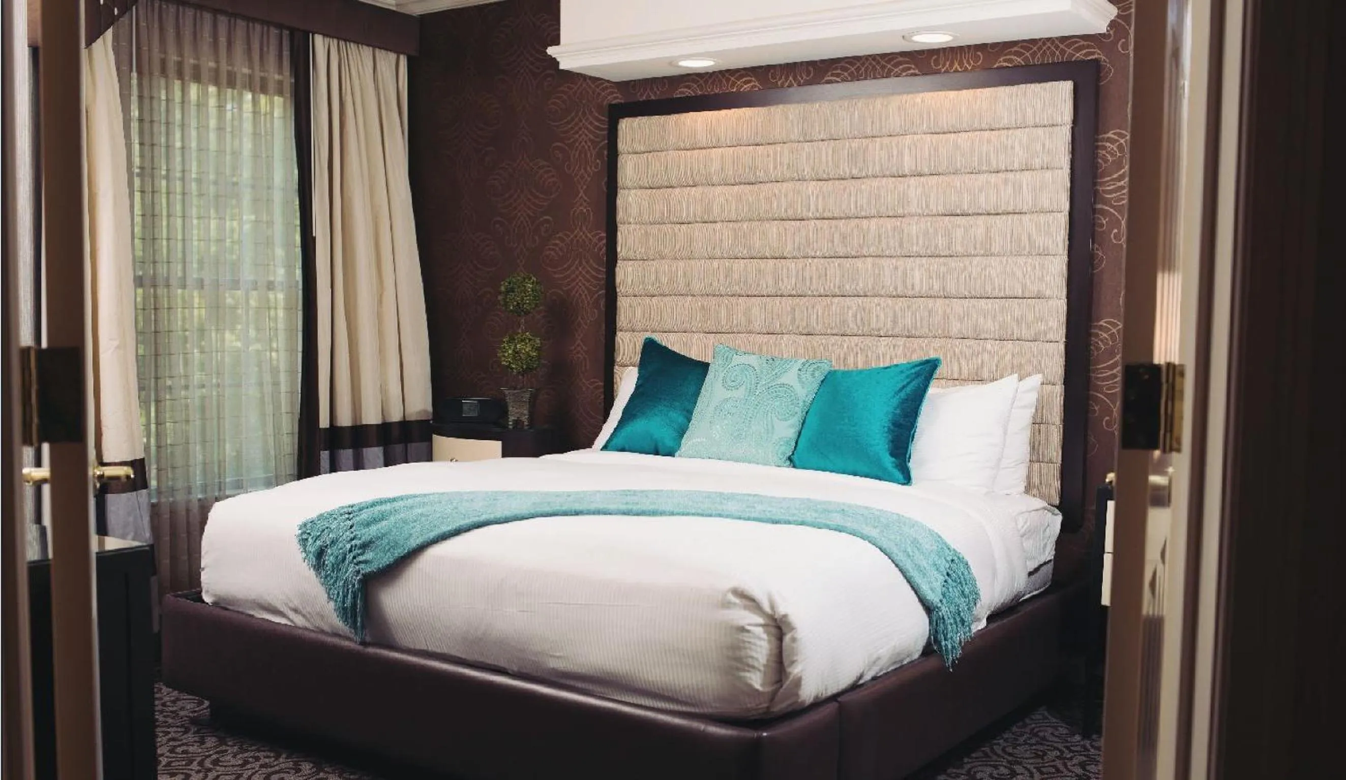 Bed in The Inn At Fox Hollow Hotel