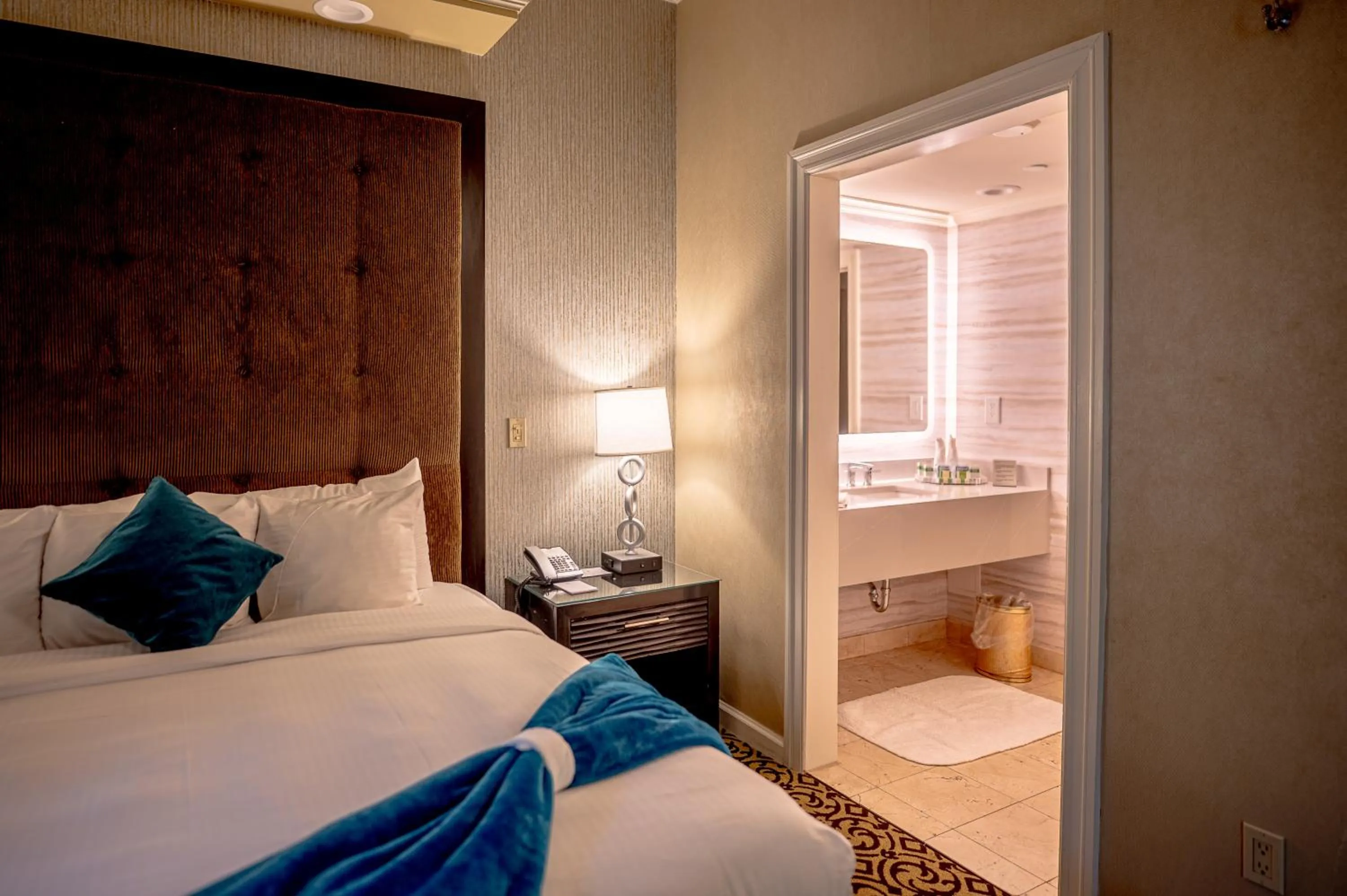 Bed in The Inn At Fox Hollow Hotel