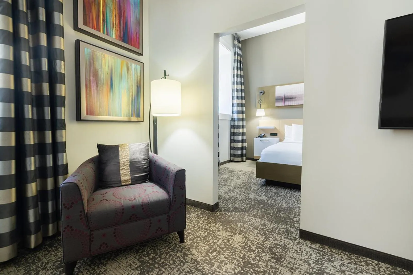 Seating area, Bed in voco Hotel Napoleon Memphis by IHG