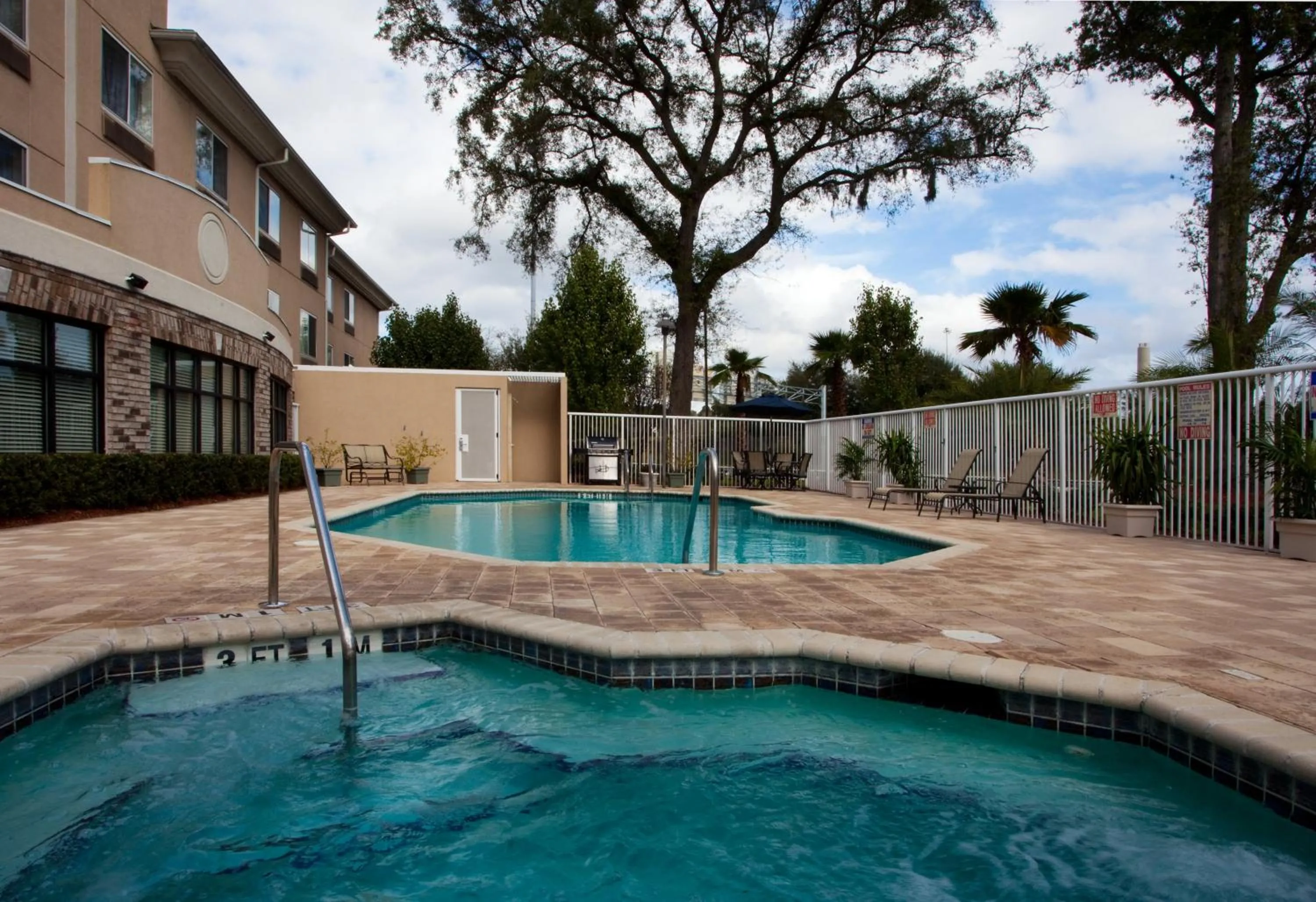 Swimming pool in Holiday Inn Express Hotel & Suites Jacksonville-Blount Island by IHG