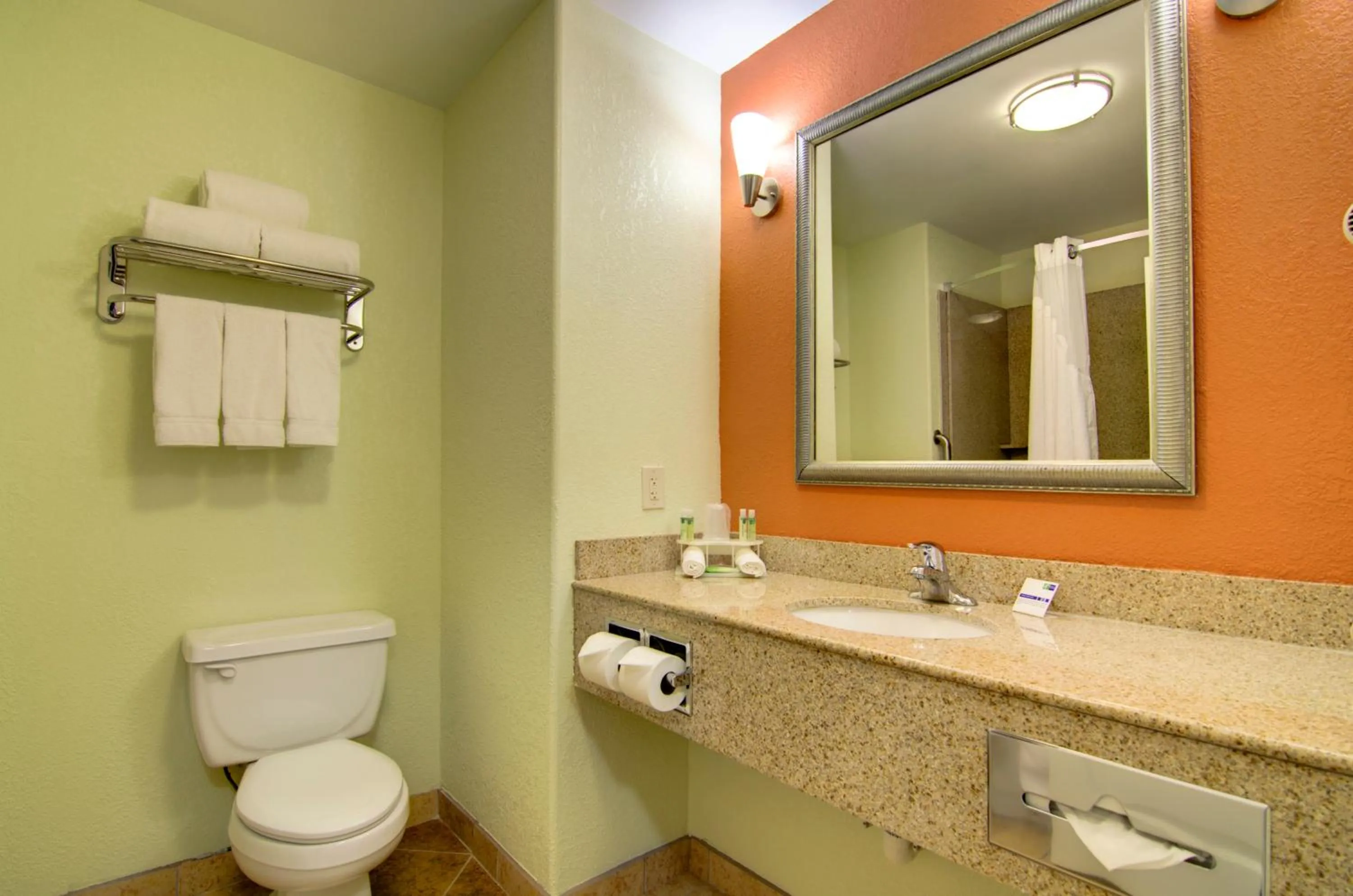 Bathroom in Holiday Inn Express Hotel & Suites Kansas City Sports Complex by IHG