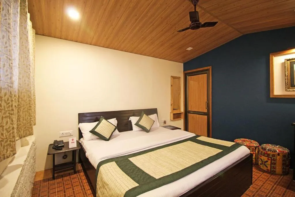 Photo of the whole room, Bed in Jharipani Castle