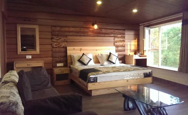 Photo of the whole room, Bed in Jharipani Castle