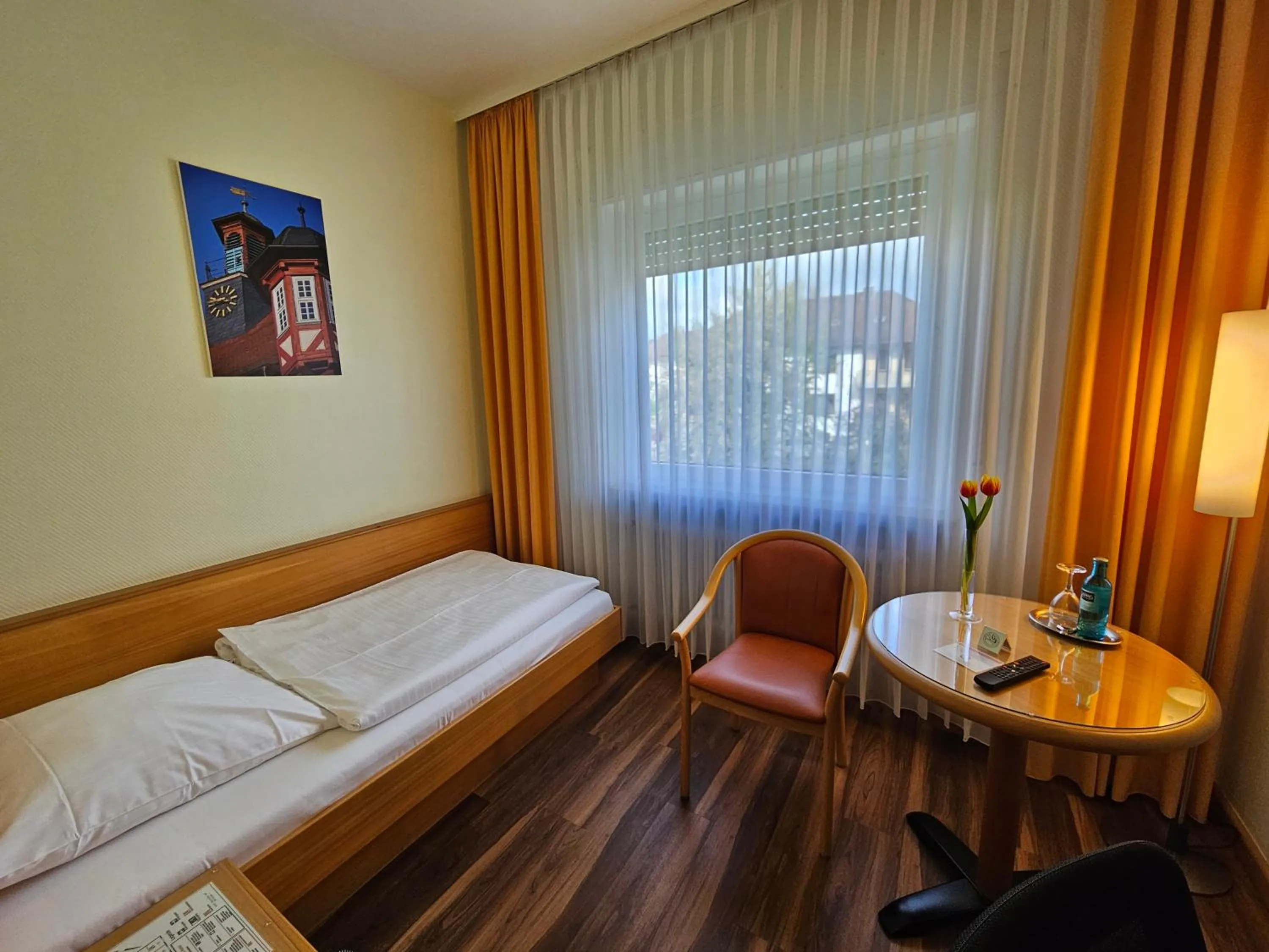Photo of the whole room, Bed in Hotel Hessischer Hof