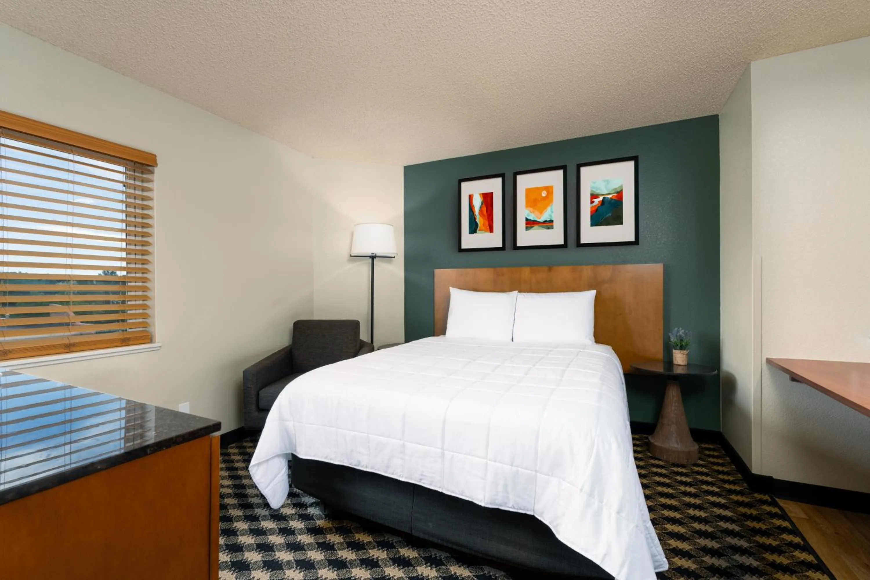 Bed in MCM Elegante Suites