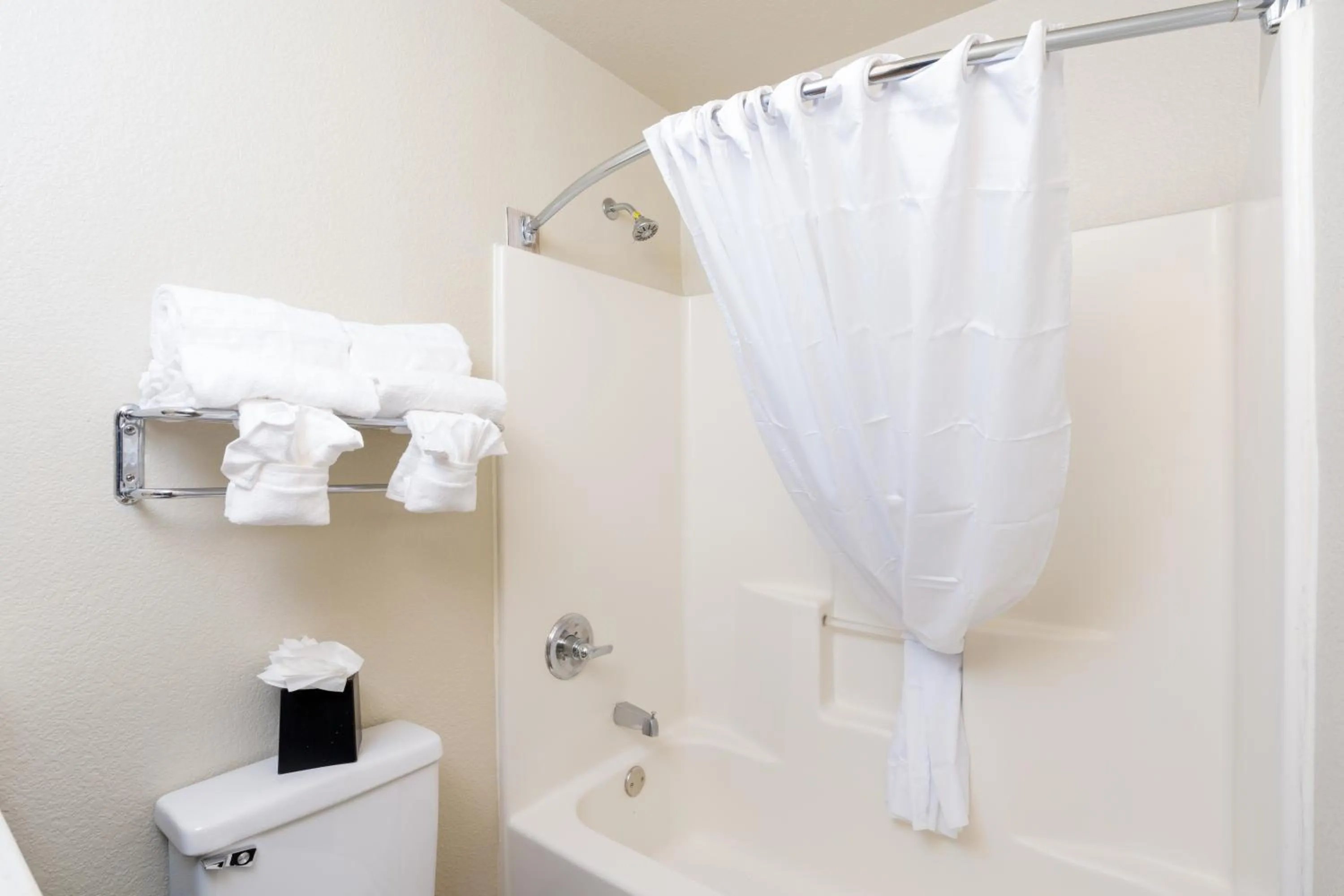 Shower in MCM Elegante Suites