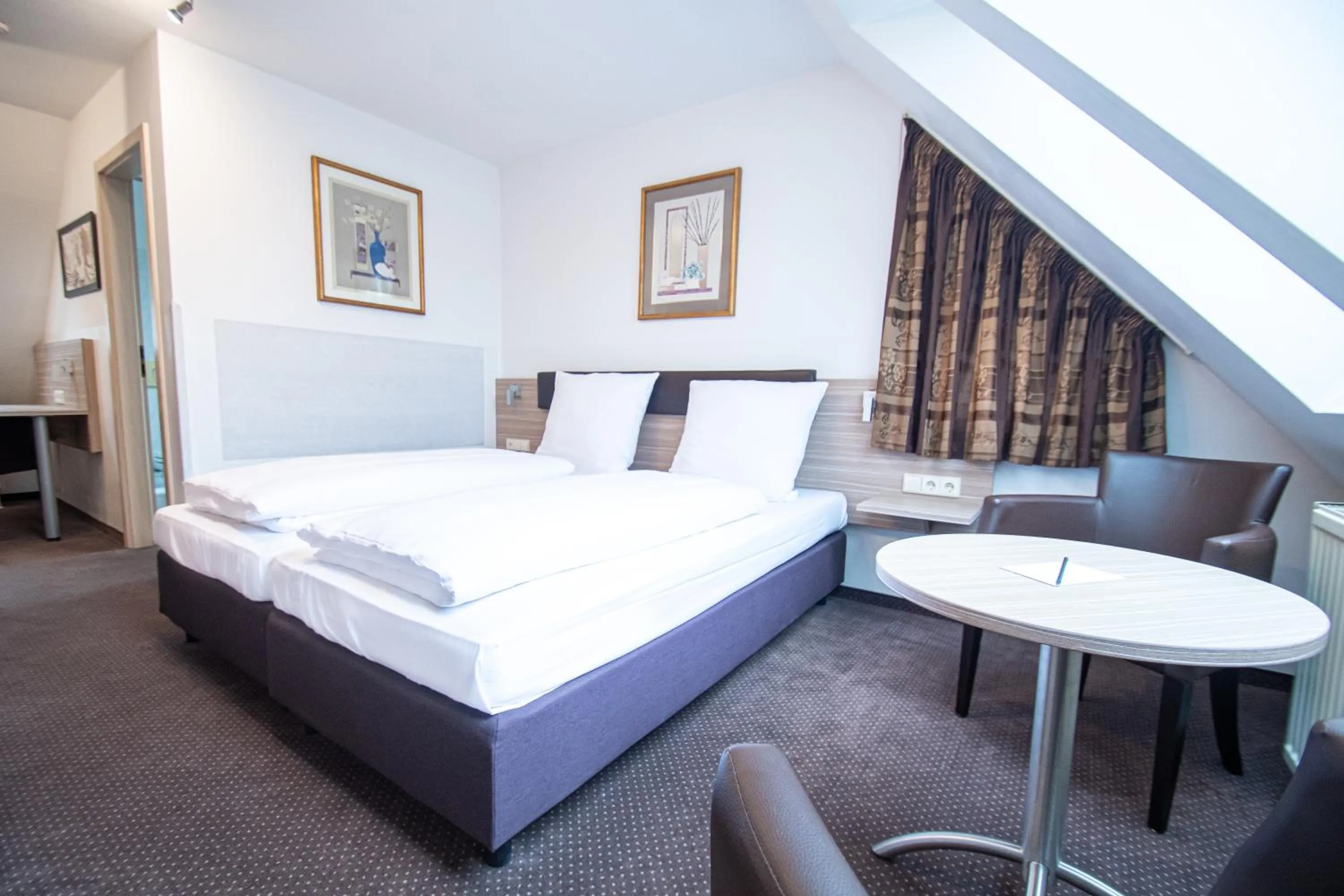 Bed in Taste Smart Hotel Backnang