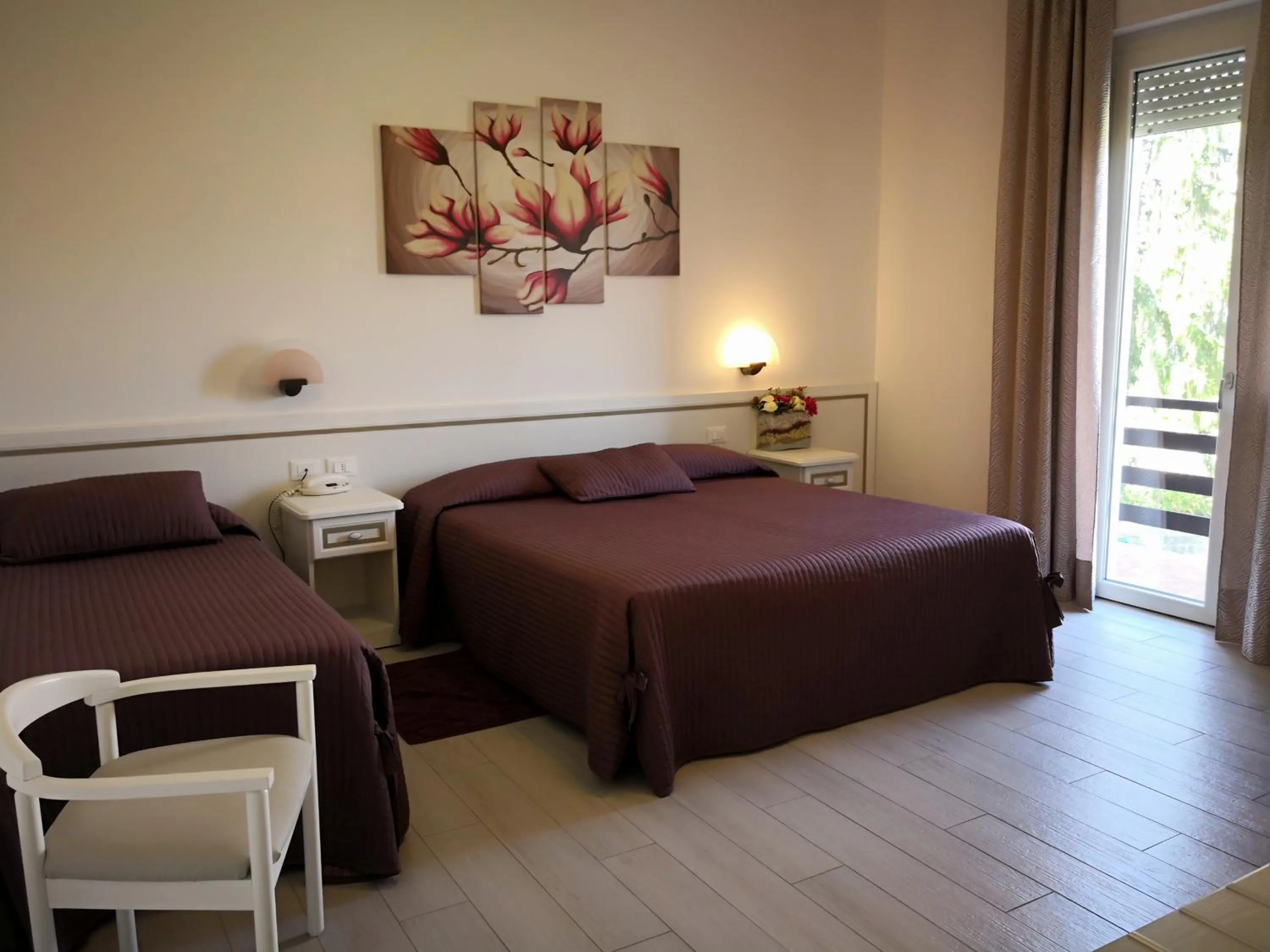 Bed in Albergo Ester