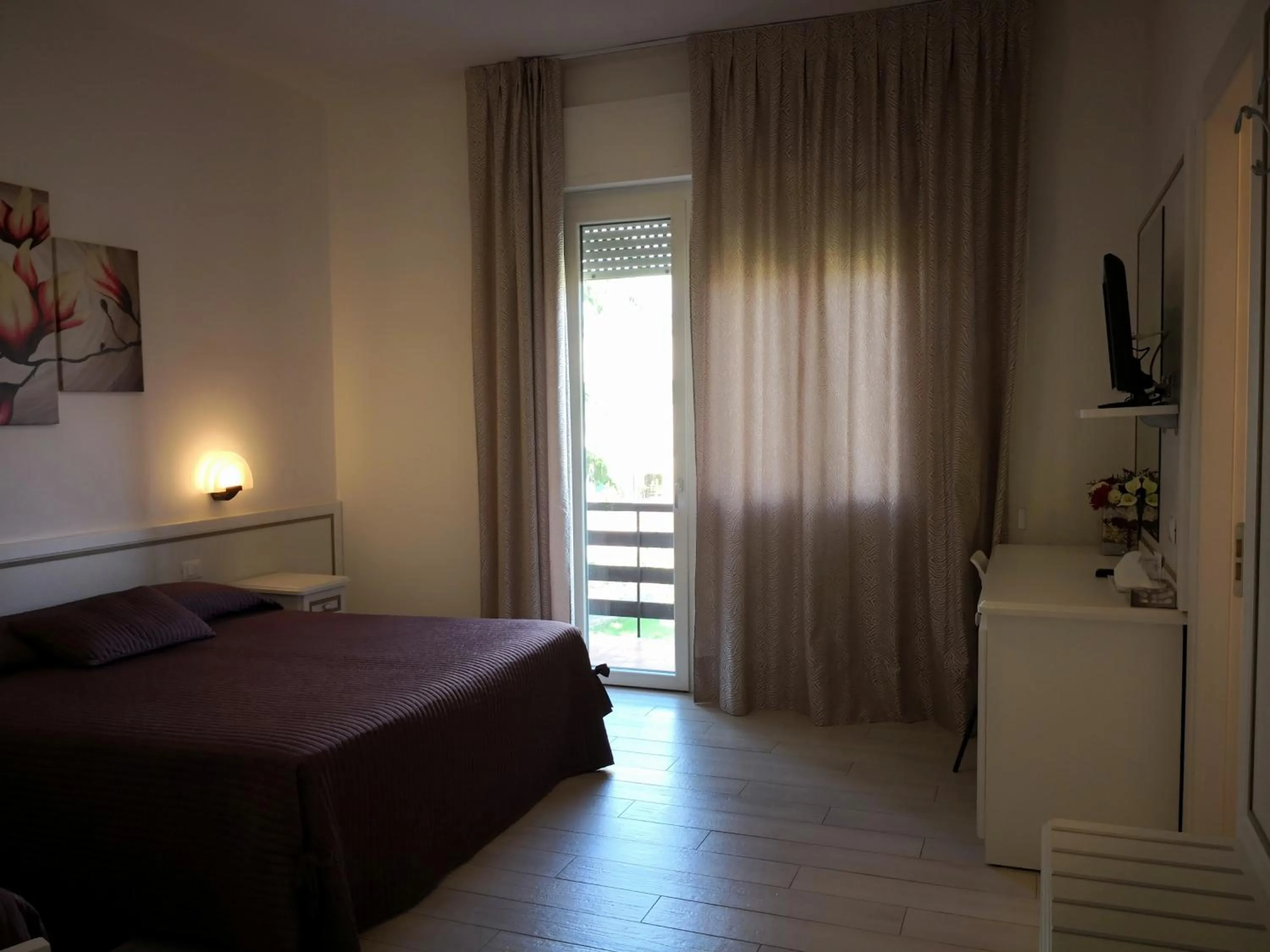 Bed in Albergo Ester