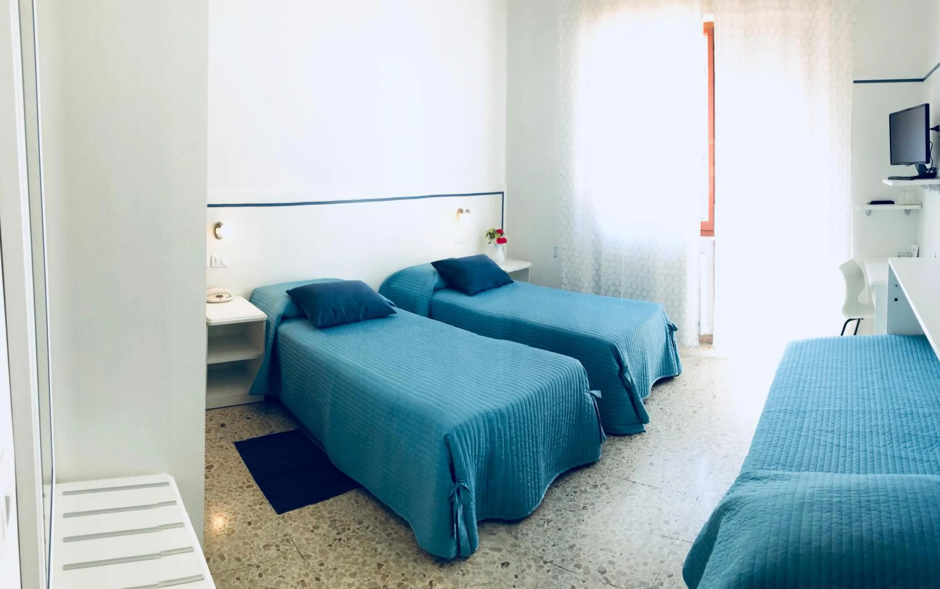 Bed in Albergo Ester