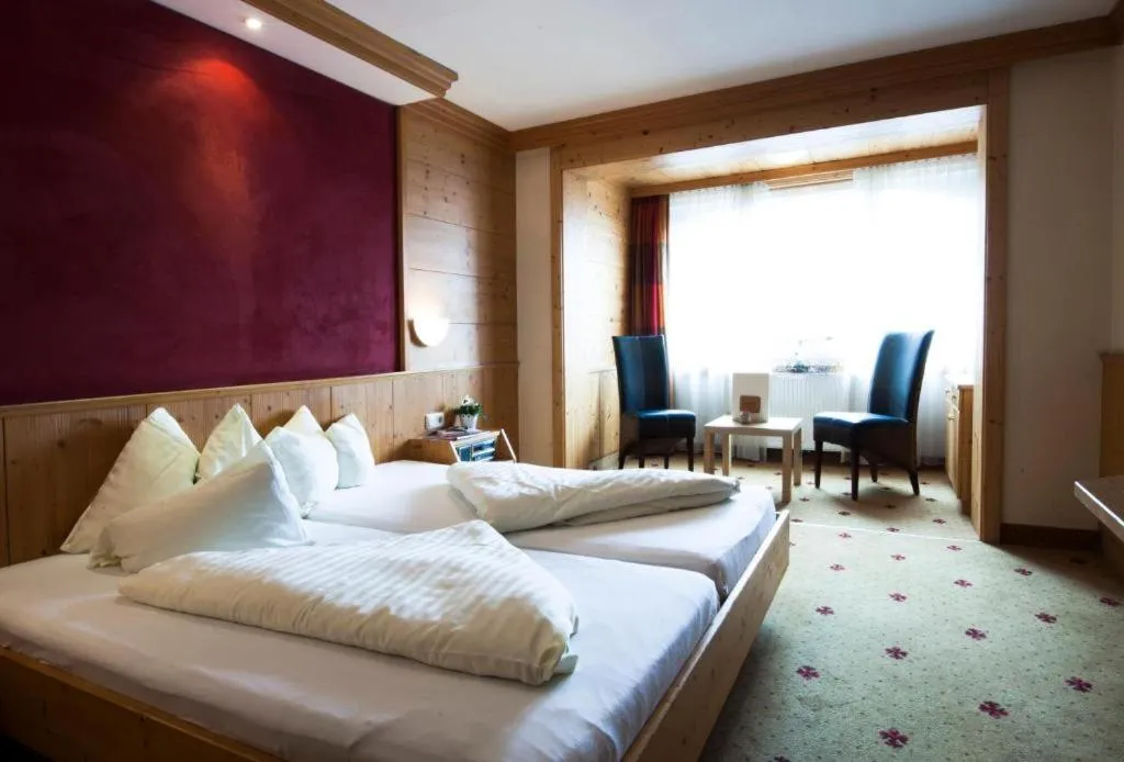 Photo of the whole room, Bed in Hotel Alpina nature-wellness