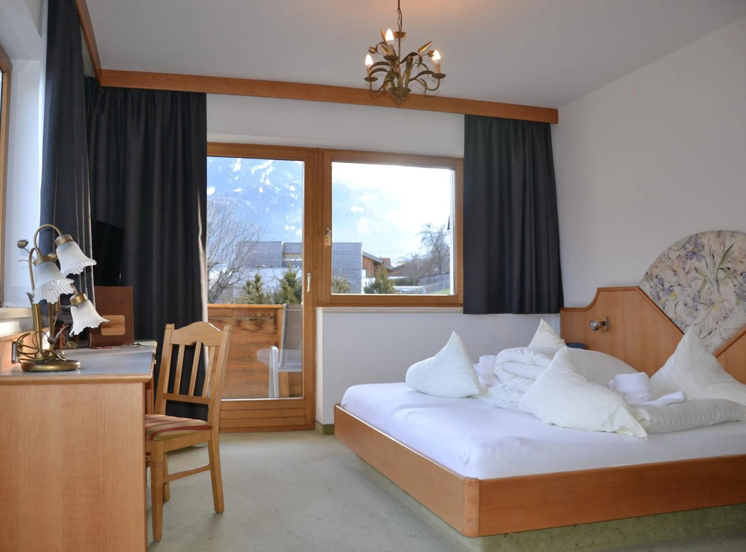 Photo of the whole room, Bed in Hotel Alpina nature-wellness