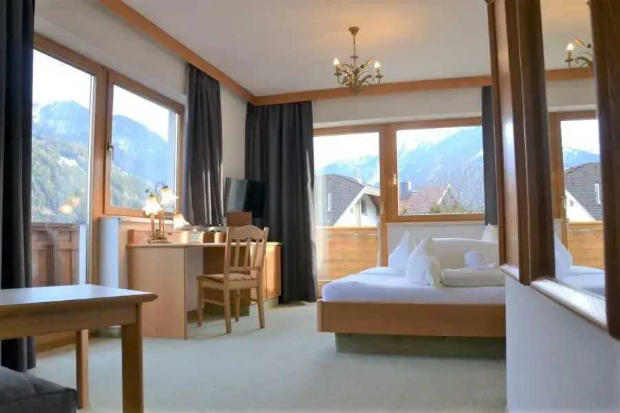 Comfort Double Room in Hotel Alpina nature-wellness Comfort Double Room in Hotel Alpina nature-wellness