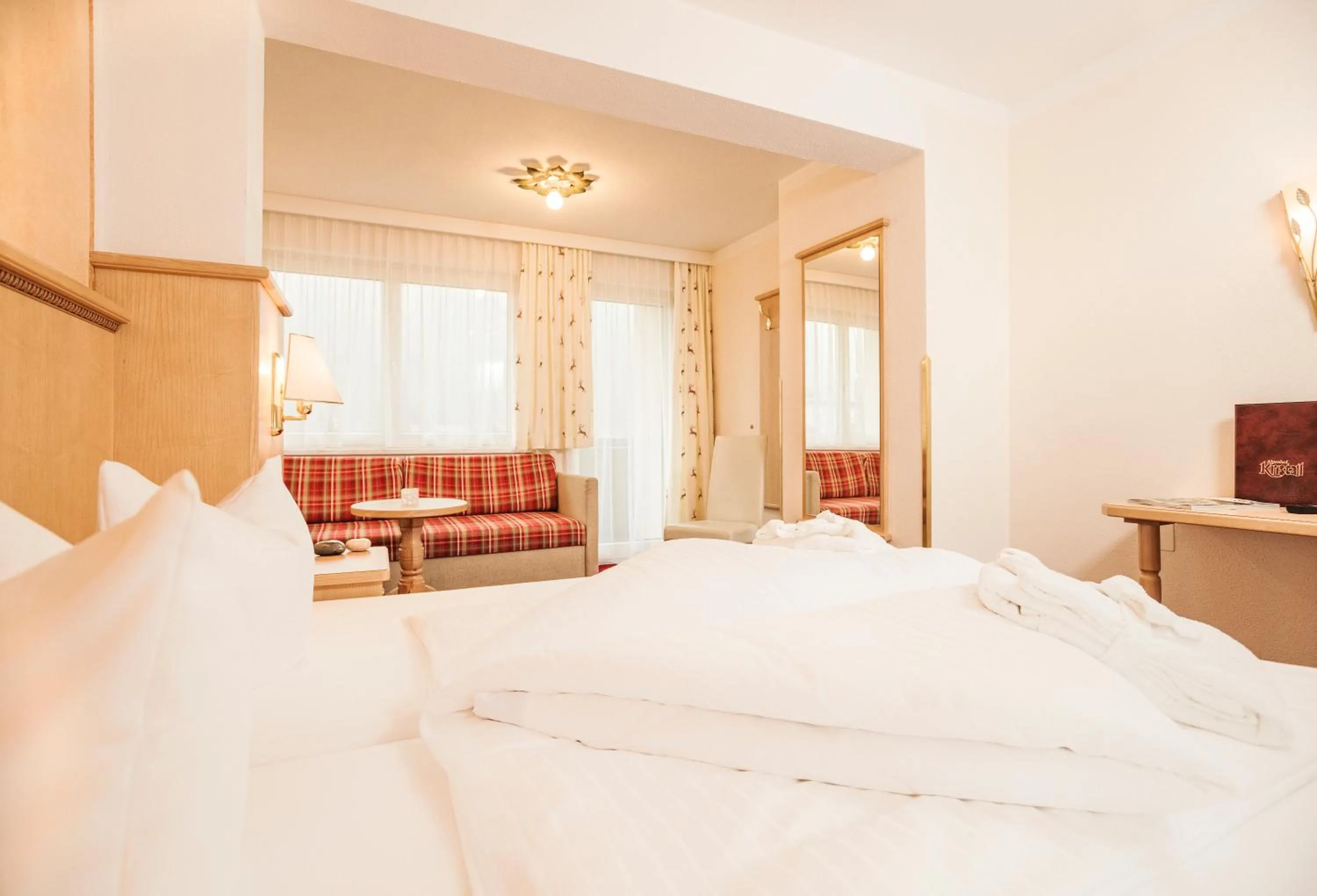 Photo of the whole room, Bed in Hotel Alpenhof Kristall