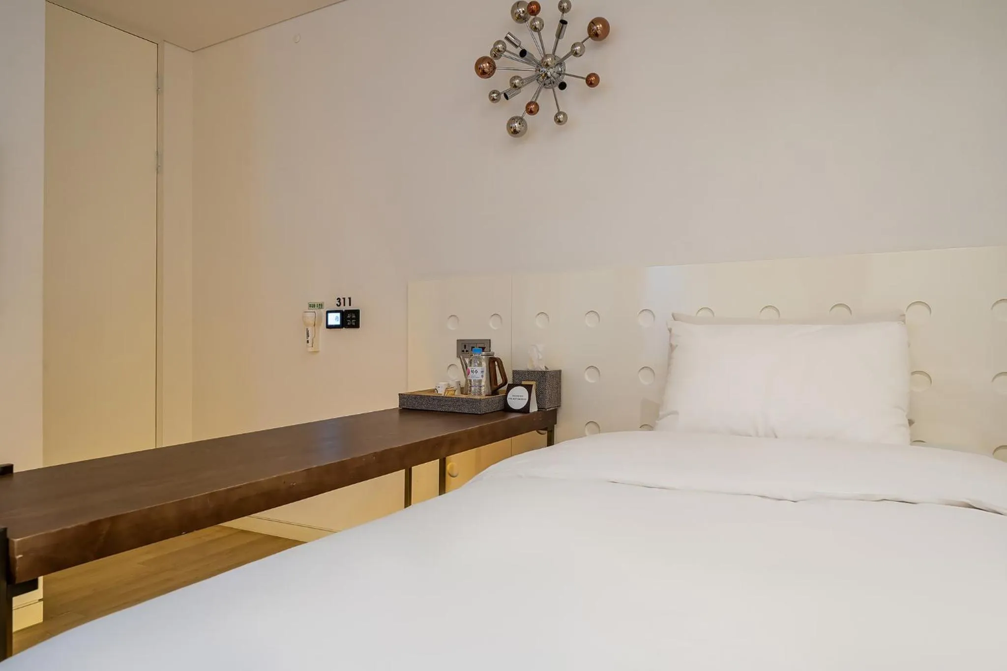 Bed in Hotel The Designers Kondae