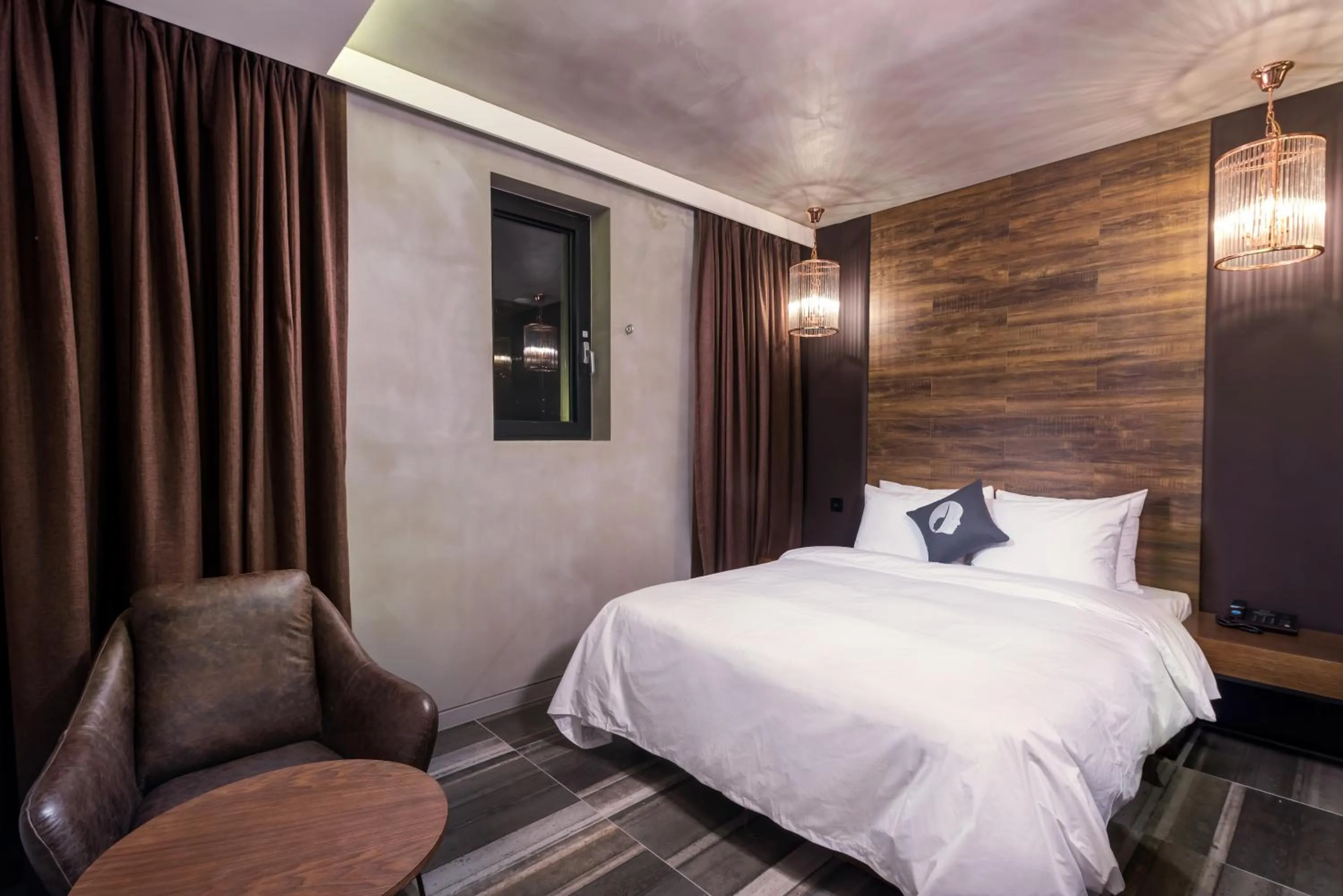 Bed in Hotel The Designers Kondae