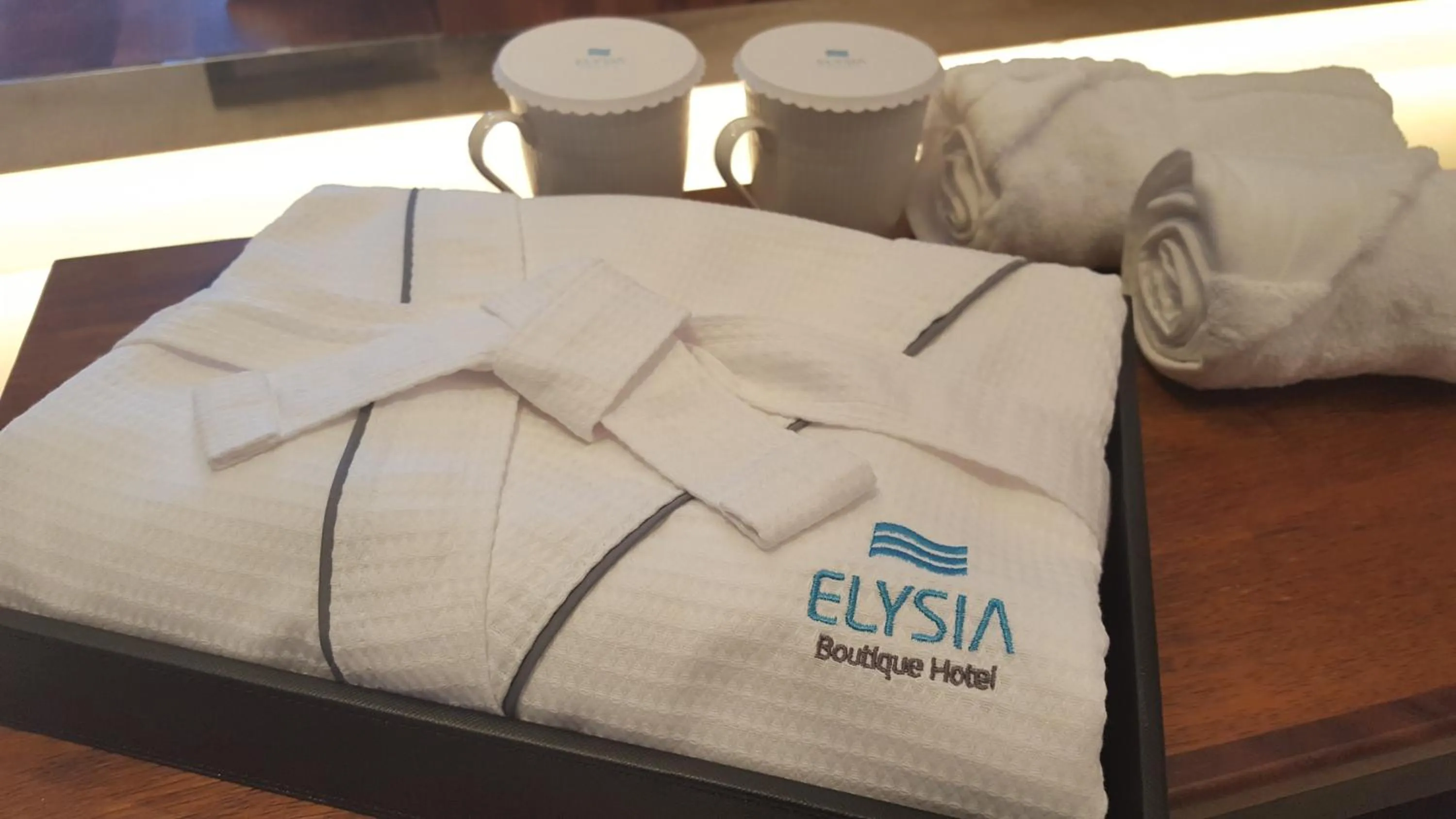 Property logo or sign, Bed in Elysia Boutique Hotel