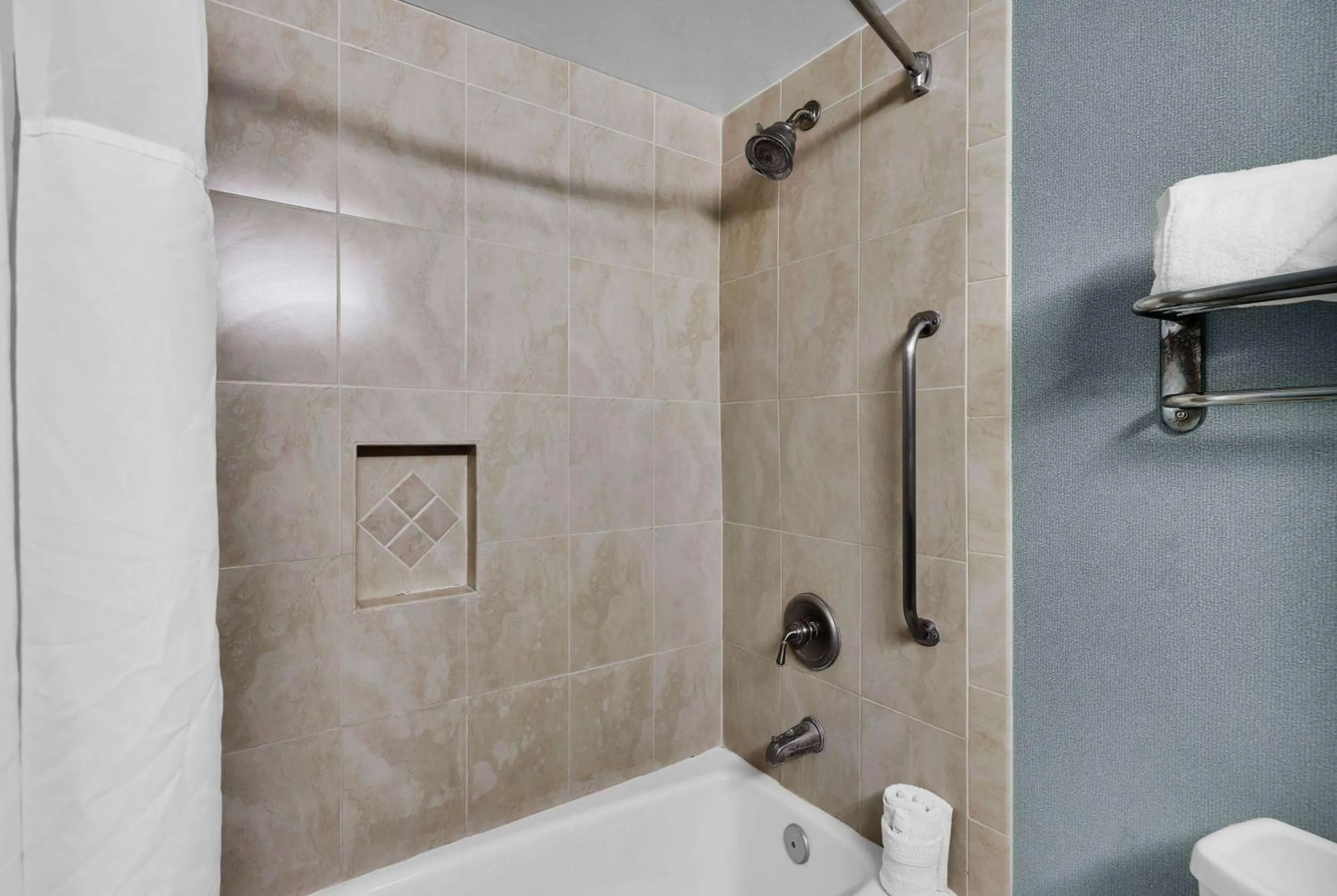 TV and multimedia in Ramada by Wyndham Jacksonville I-95 by Butler Blvd