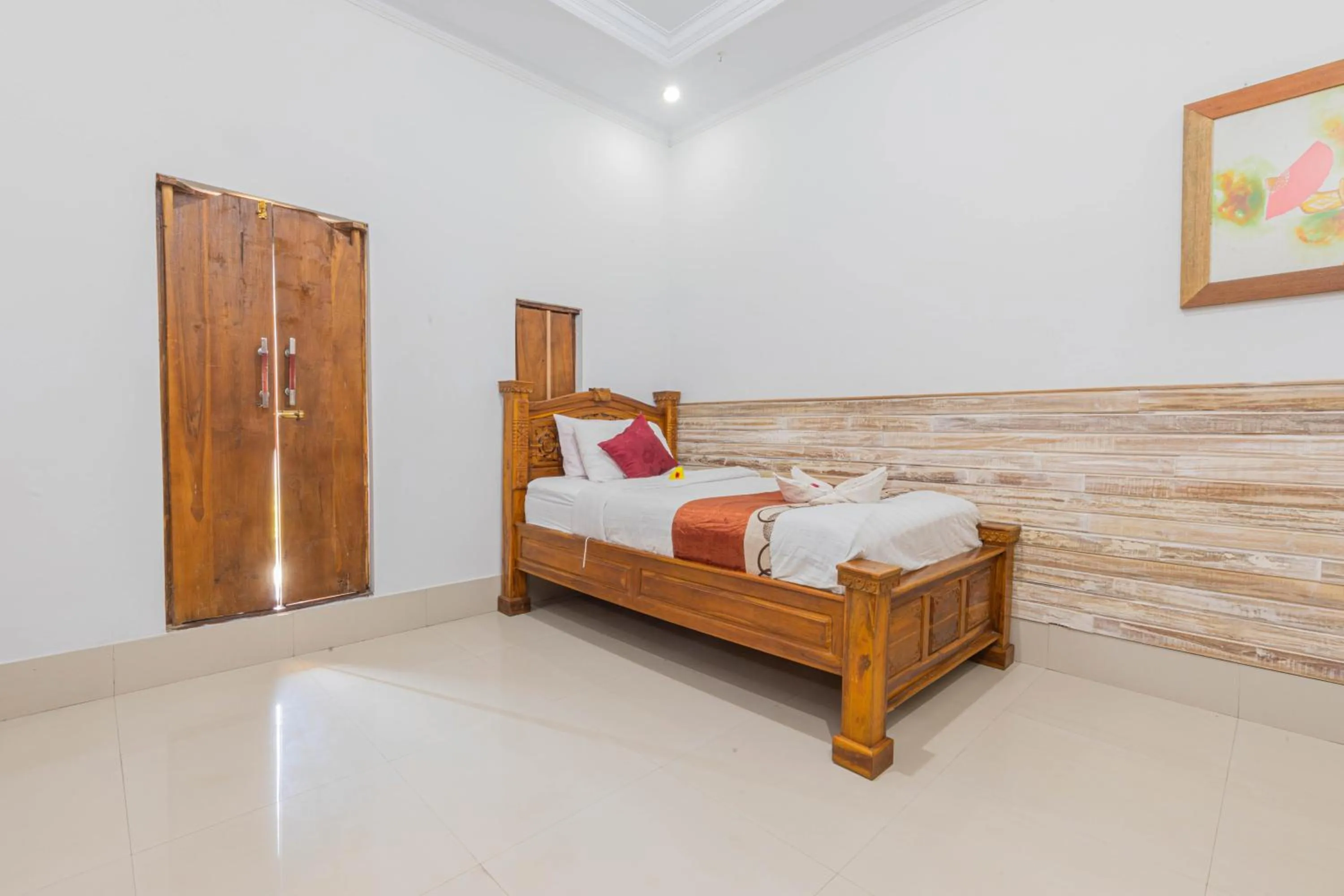 Bed in Manta Cottages with Sea View