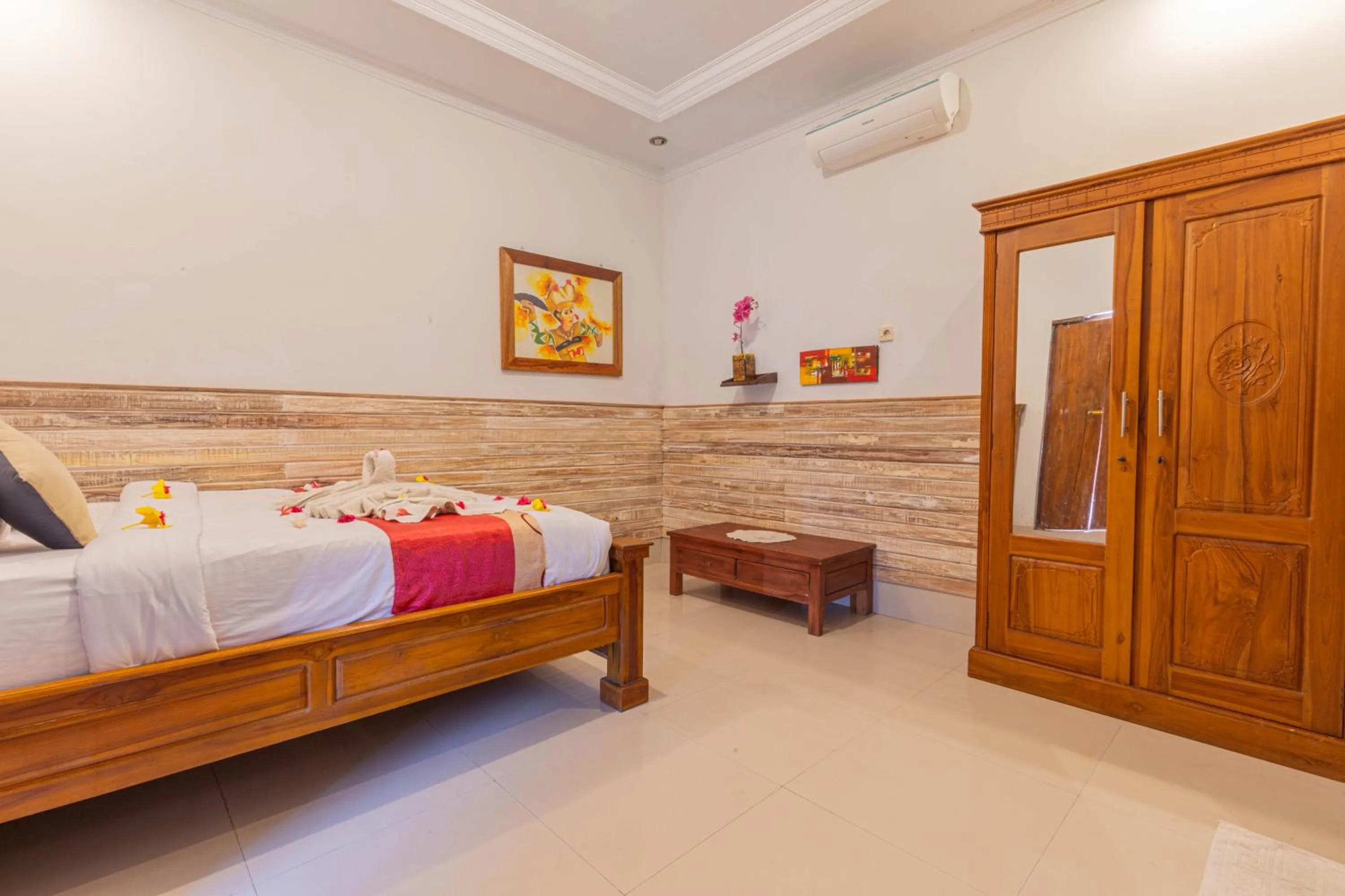 Bed in Manta Cottages with Sea View