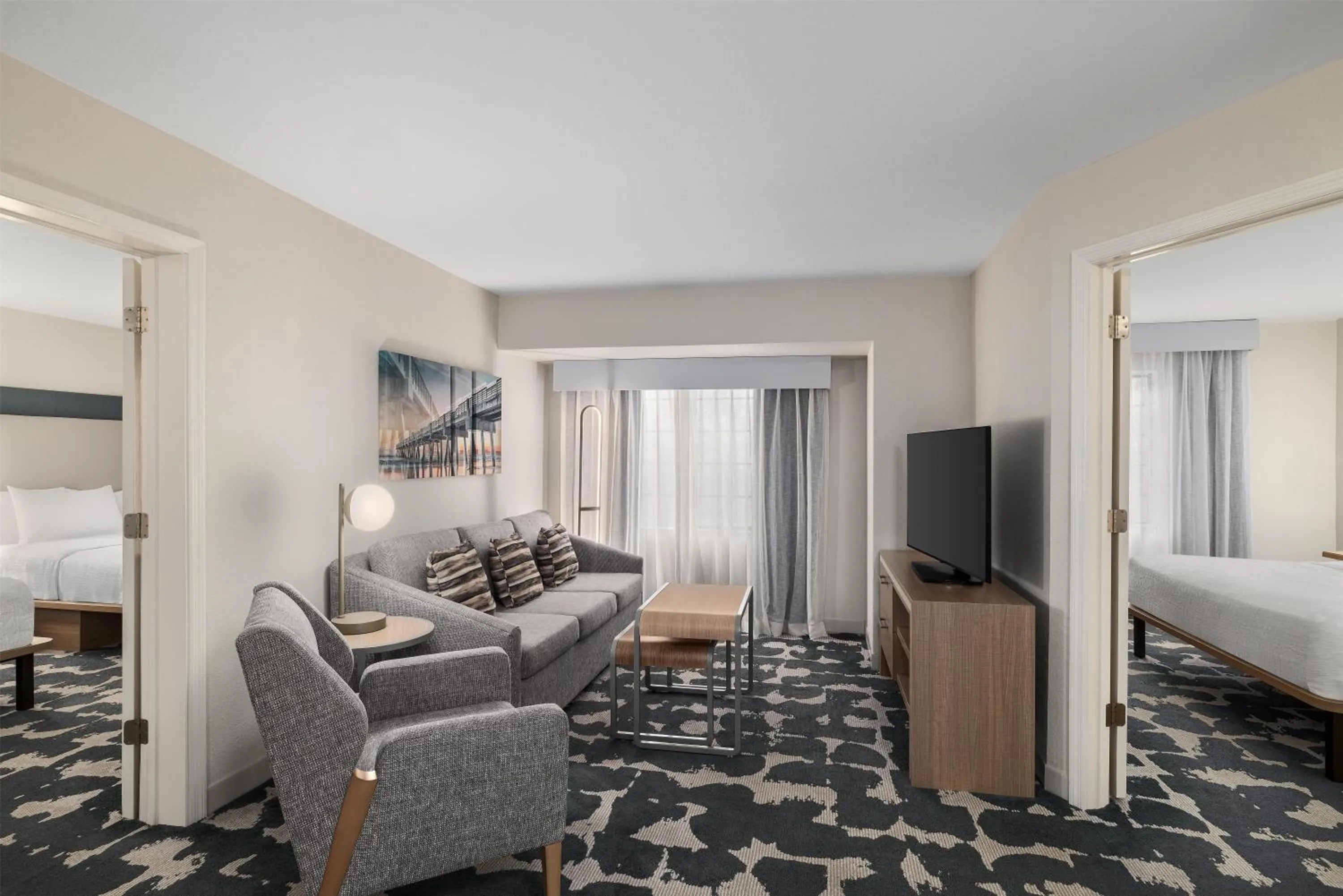 Living room, Bed in Homewood Suites Jacksonville Deerwood Park