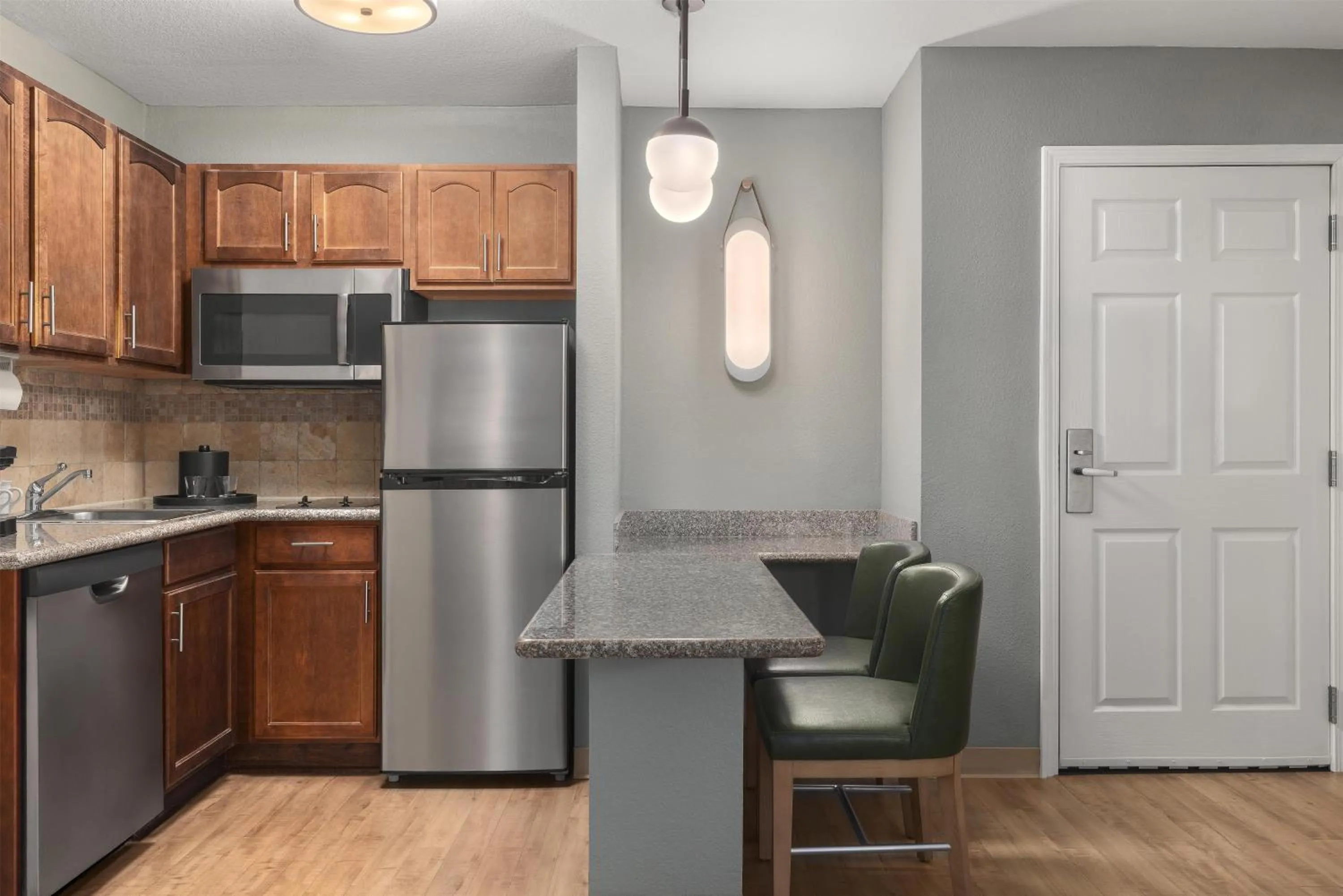 Kitchen or kitchenette in Homewood Suites Jacksonville Deerwood Park