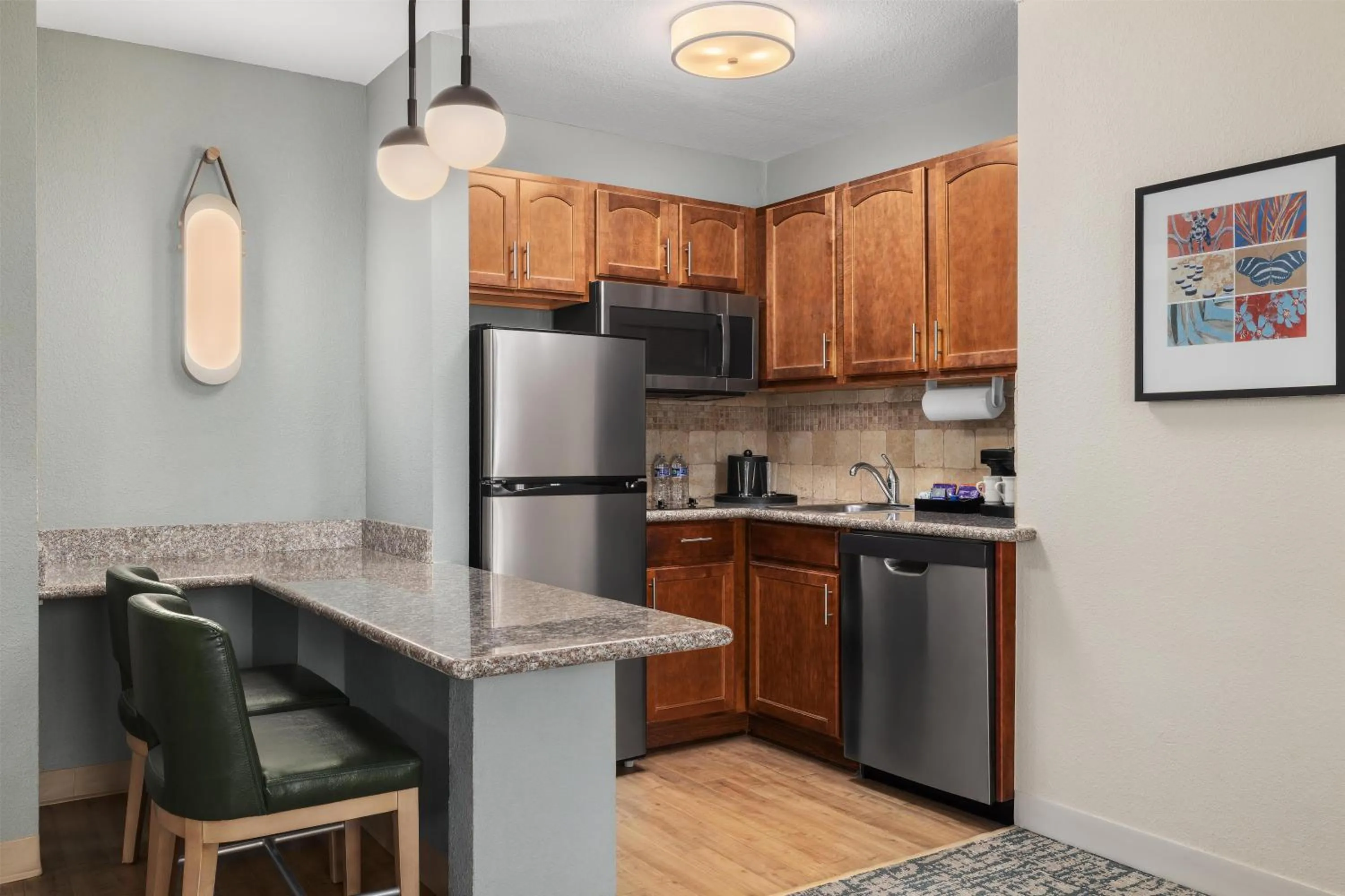 Kitchen or kitchenette in Homewood Suites Jacksonville Deerwood Park