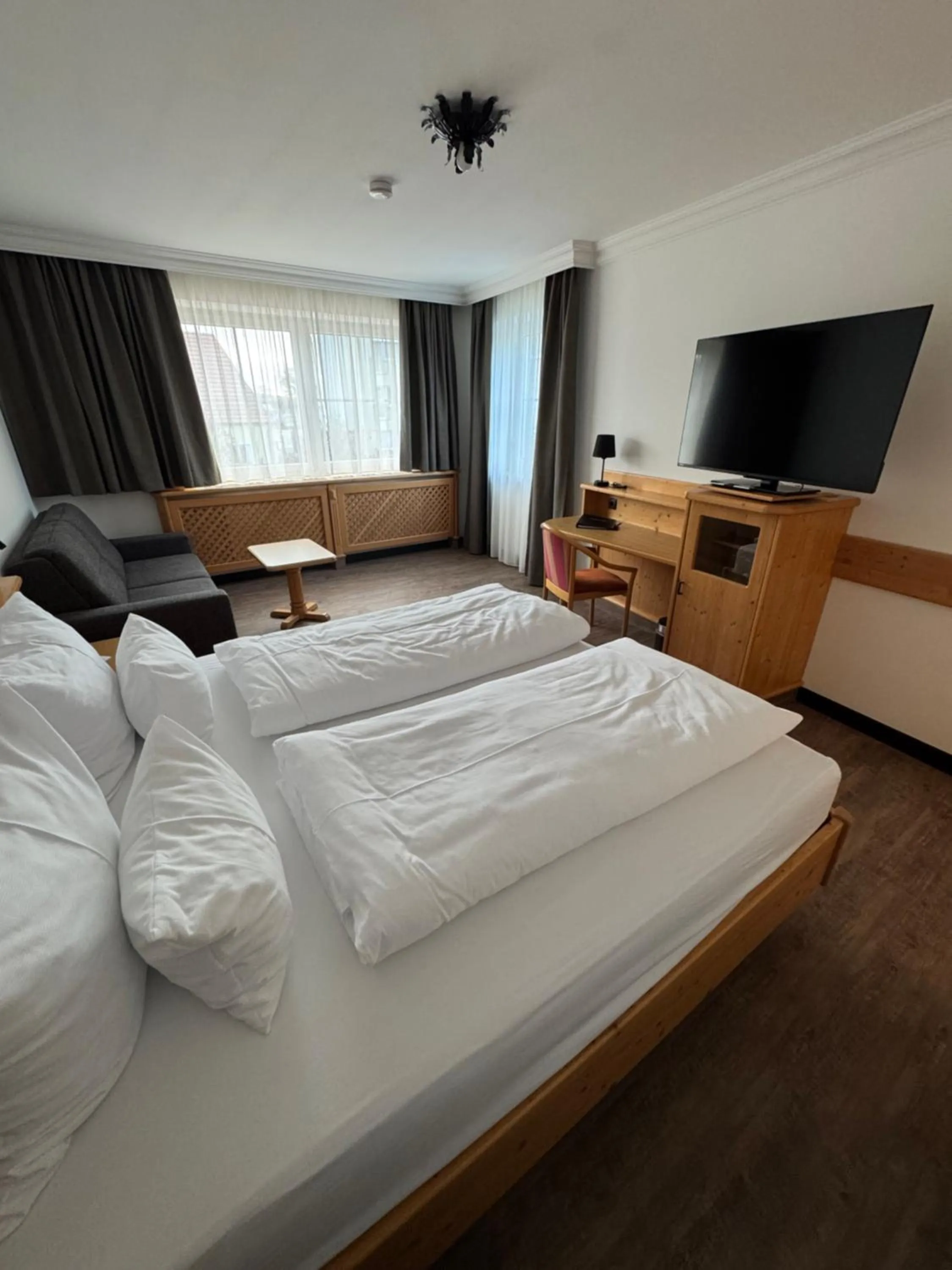 Bed in Self-Check-in Hotel VinoQ Mistelbach